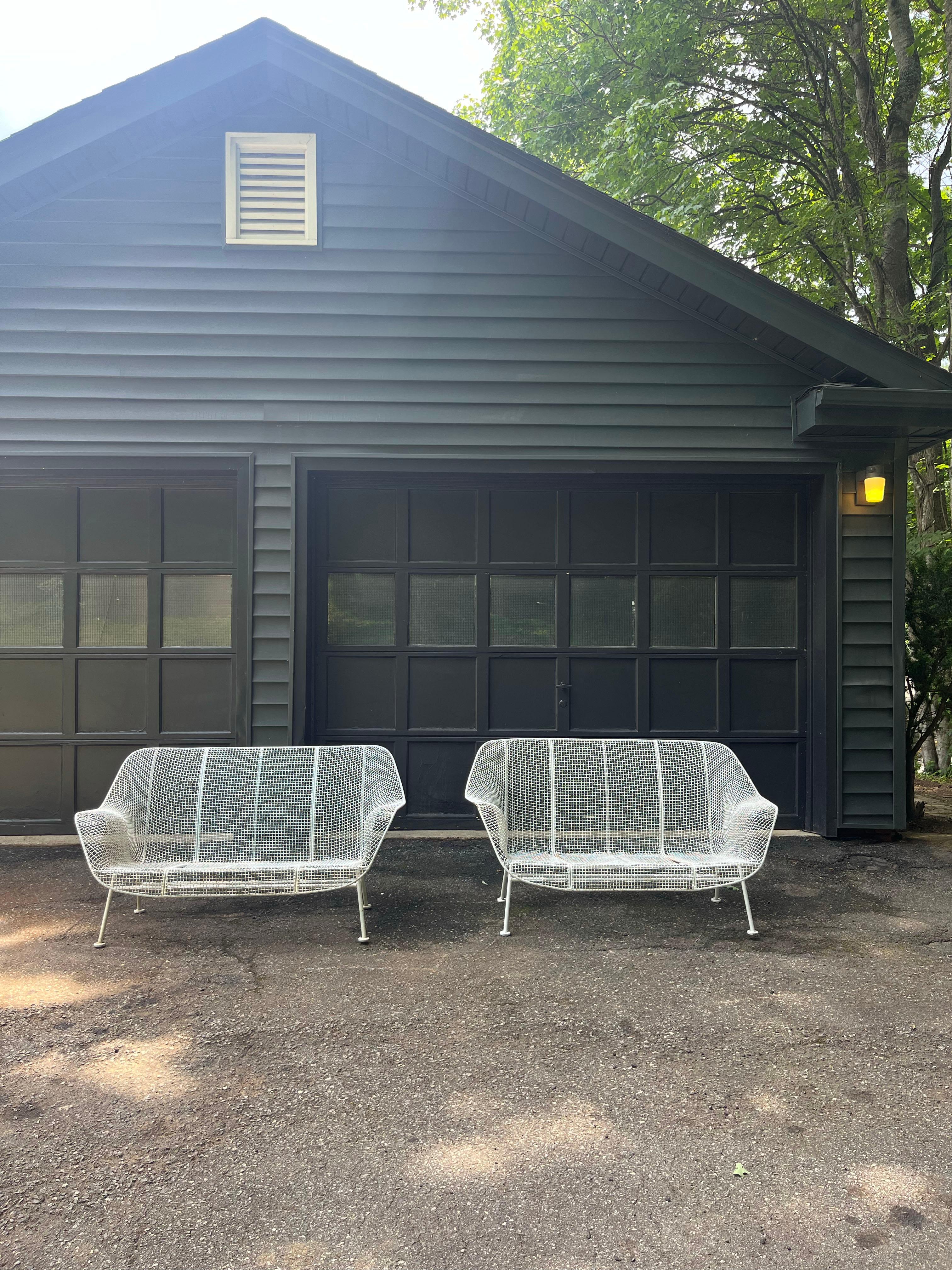 Wrought Iron Pair of Mid Century Modern outdoor 'Sculptura' settees by Russell Woodard For Sale