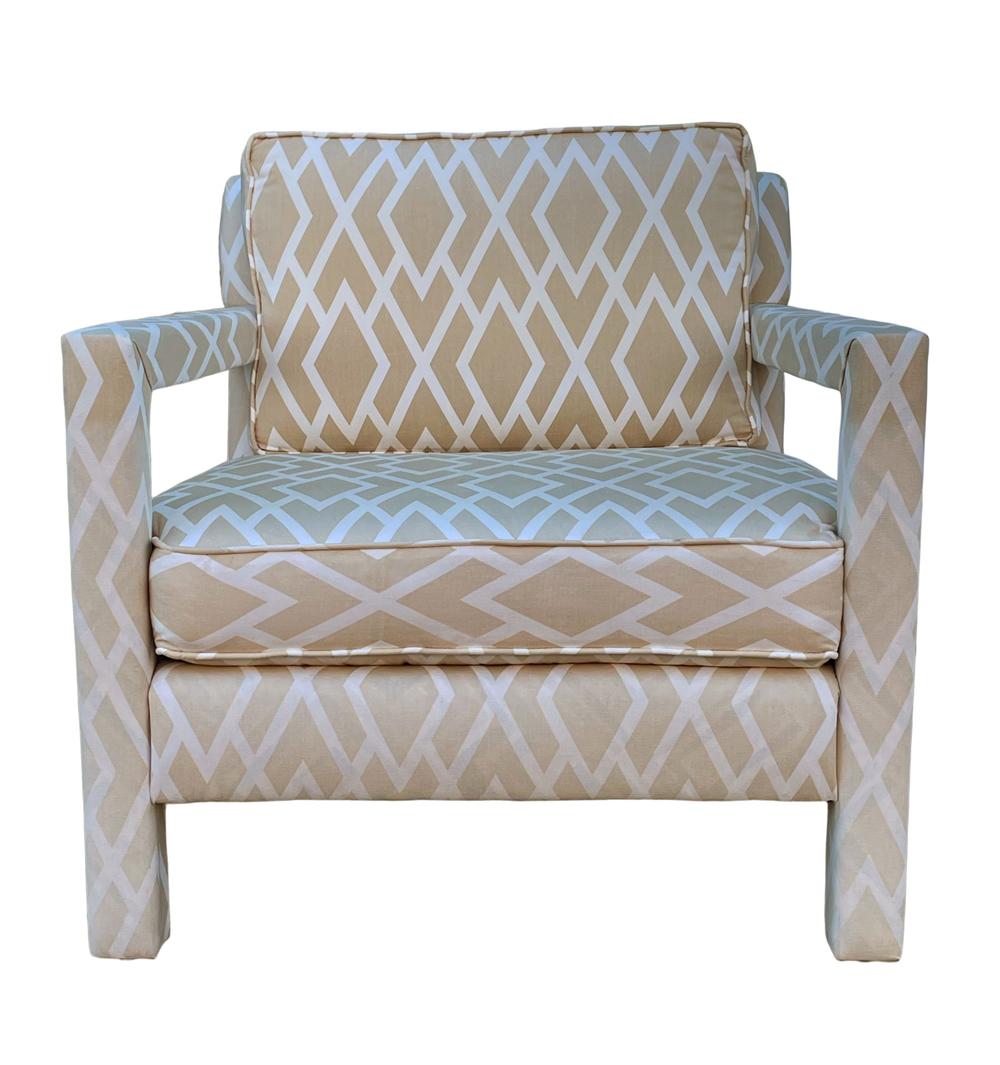 A handsome classic matching pair of fully upholstered parsons chairs. Nice deep sitting comfy chairs. Upholstery is original and could use updating. Foam and padding are soft and not dry.