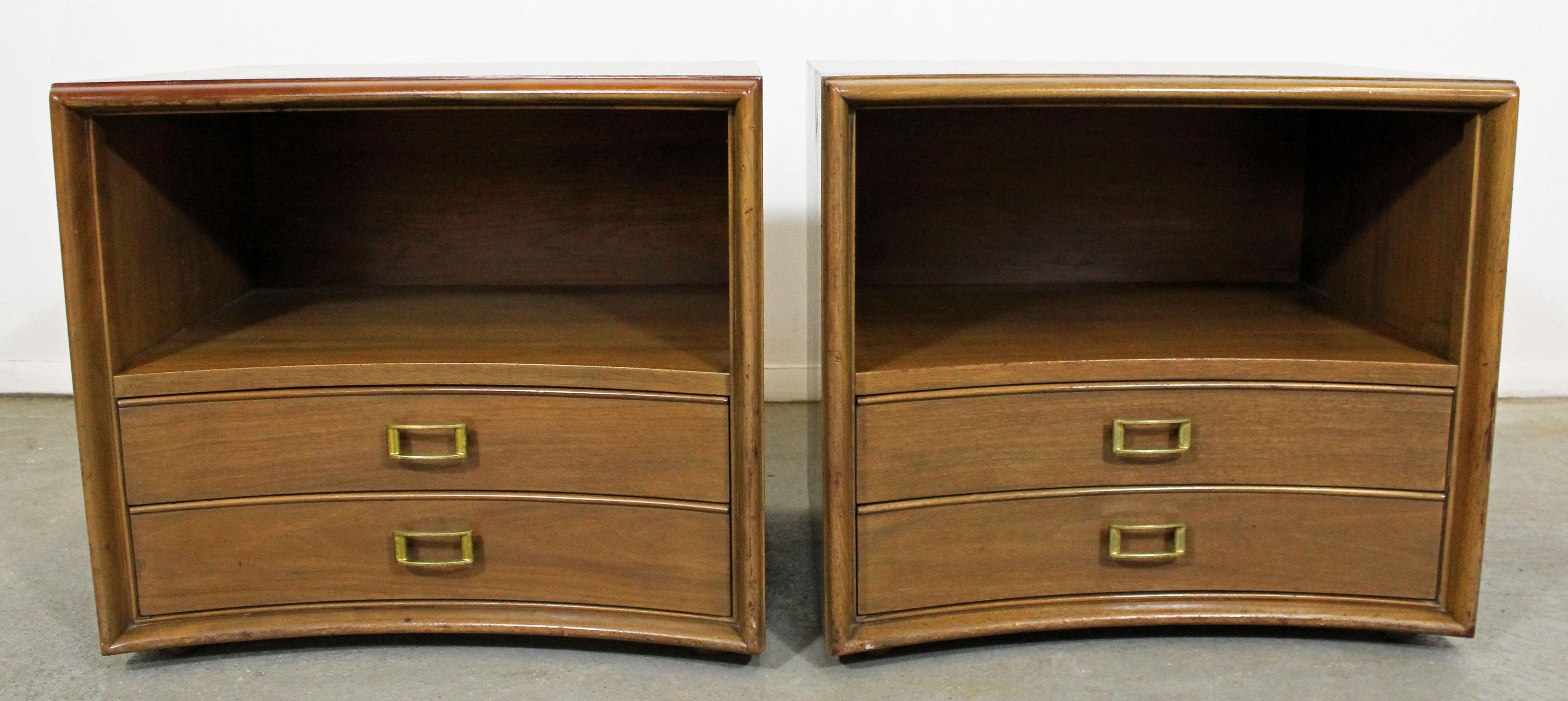 Offered is a pair of Mid-Century Modern nightstands. The set has a nice shape and modern lines. Made from satin birch, these nightstands were designed by Paul Frankl for John Stuart Furniture's 