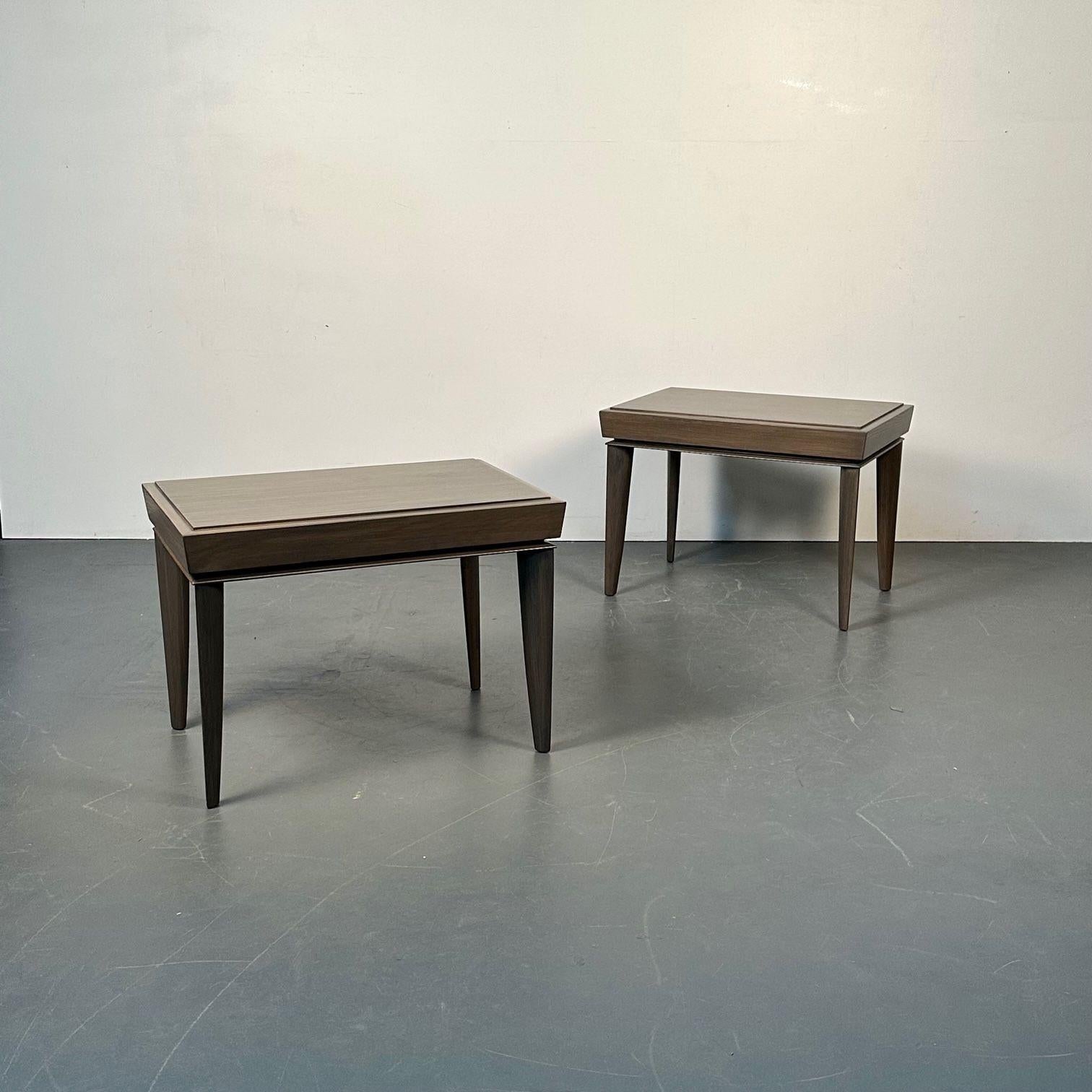 Pair of Mid-Century Modern Paul Frankl Labeled Brown Saltman Side / End Tables
 
Set of rectangular mid-century end tables in a chic ash driftwood grey matte finish. Each having stepped edges and four oval tapered ash. 
 
21 H x 29 W x 19 D
 
ISXA