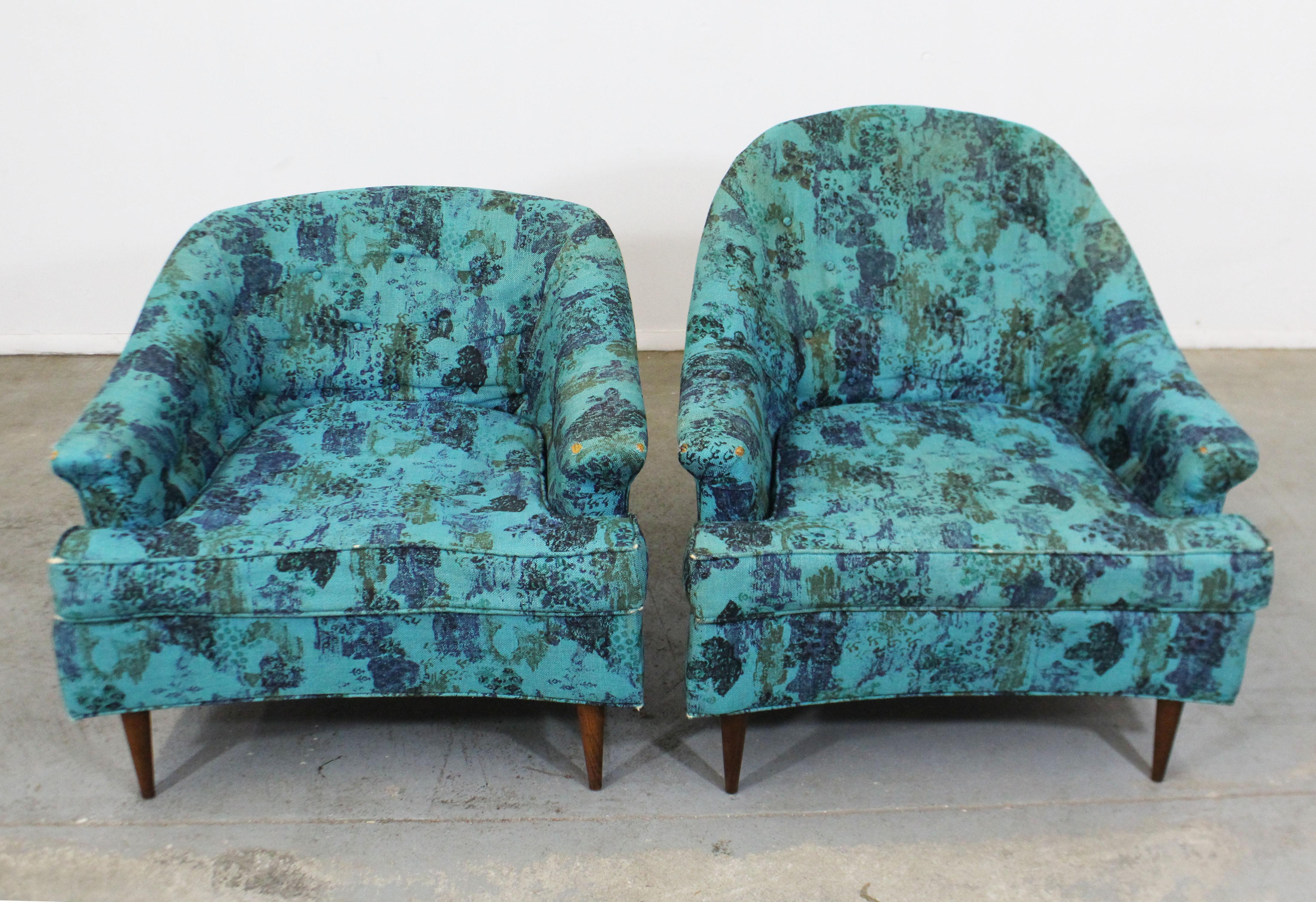 Offered is a pair of vintage Mid-Century Modern lounge chairs made by Prestige. Absolutely incredible lines on these chairs. Features original tufted backs and removable seat cushions. They are in structurally sound condition and need to be