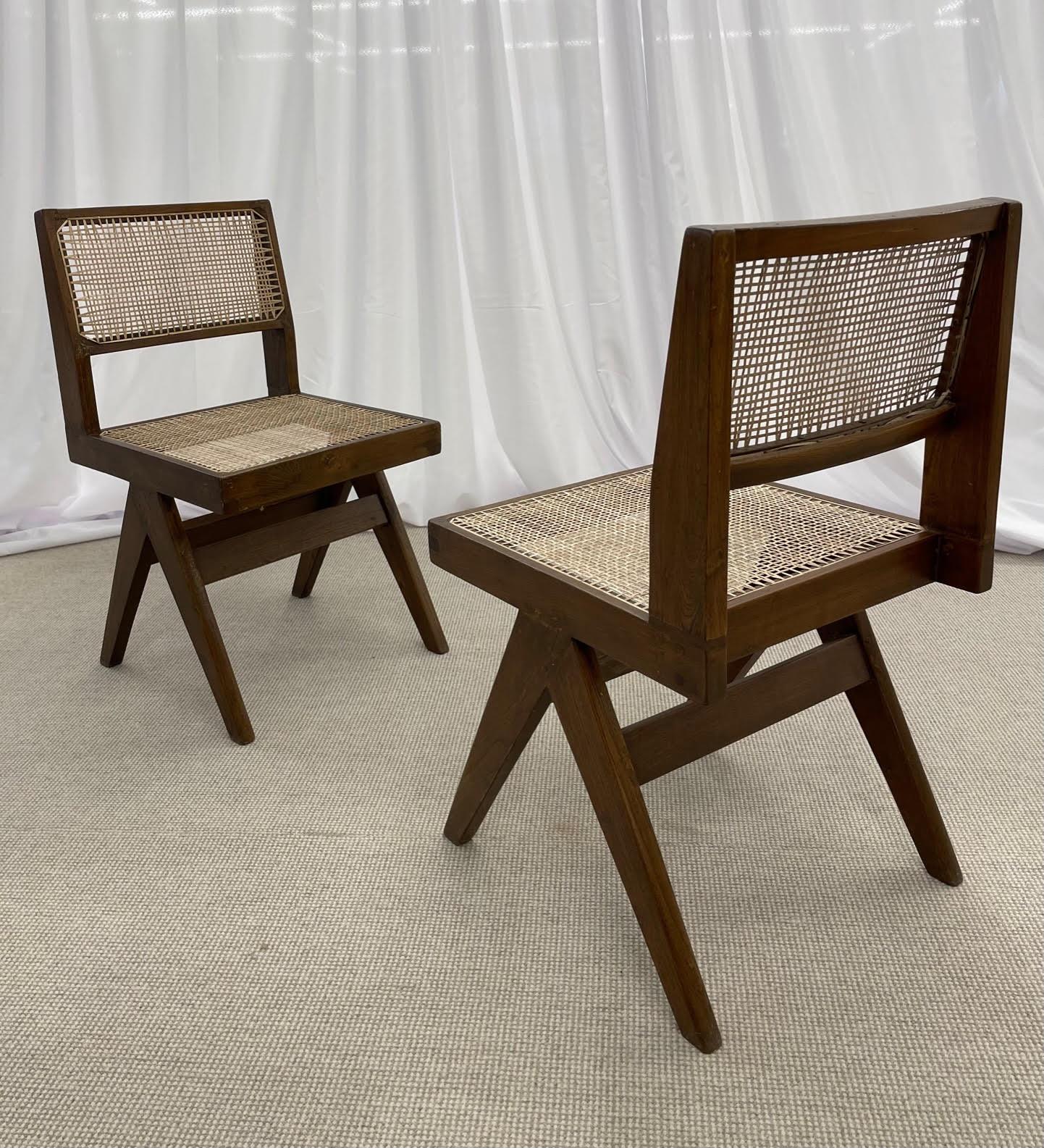 A rare set of authentic arm less dining chairs (not to restrict movement) re-polished and re-caned chairs in India. Dimensions vary slightly due to the handmade nature of this design. All items are guaranteed to be 100 percent authentic Jeanneret