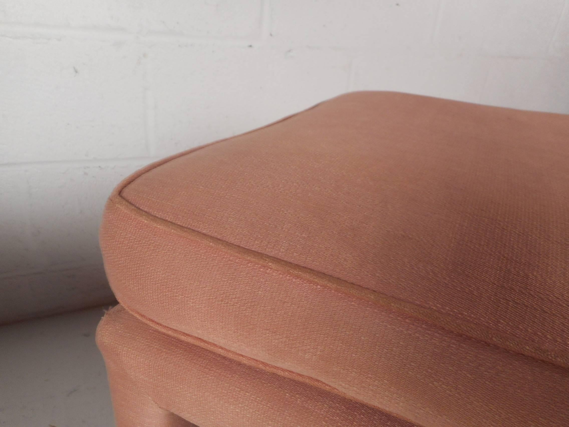 Pair of Mid-Century Modern Pink Ottomans 1