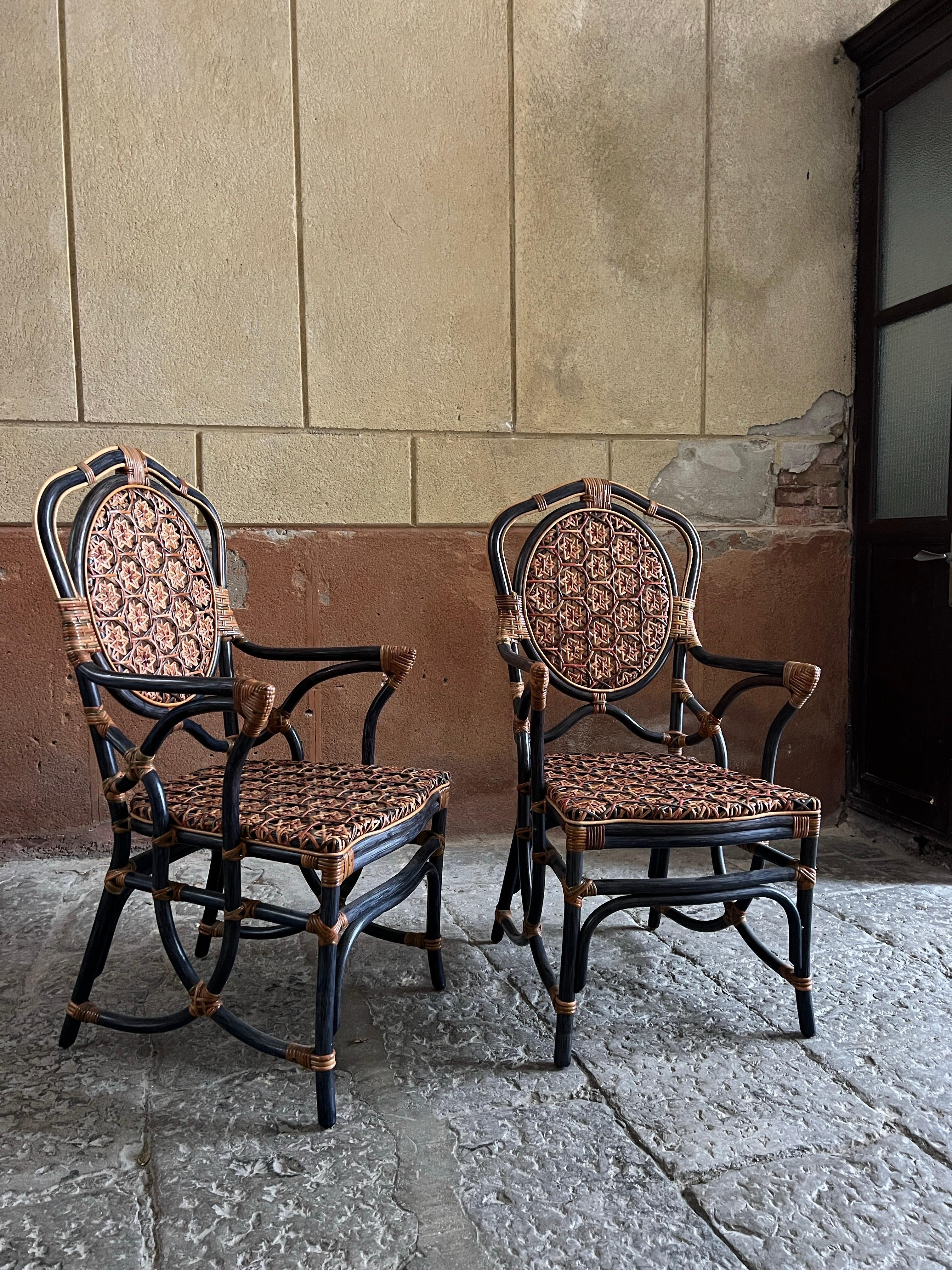Pair of Rattan and Cane Chairs, Made in Italy

This rare pair of mid-century modern chairs, crafted from rattan and cane, represents the pinnacle of craftsmanship, a synthesis of tradition, and a celebration of luxury—all embodied in a single seat.
