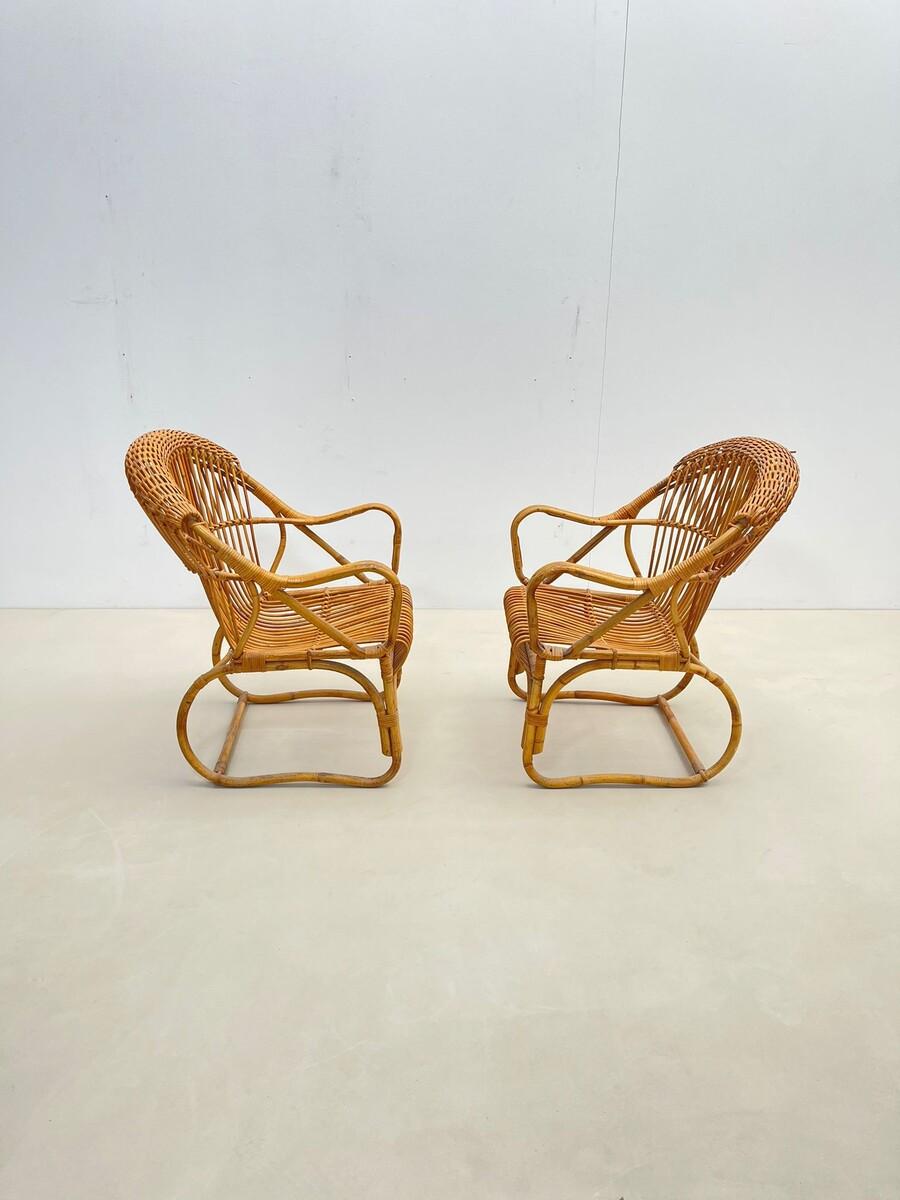 Paire de fauteuils en rotin de style moderne du milieu du siècle, années 1960.