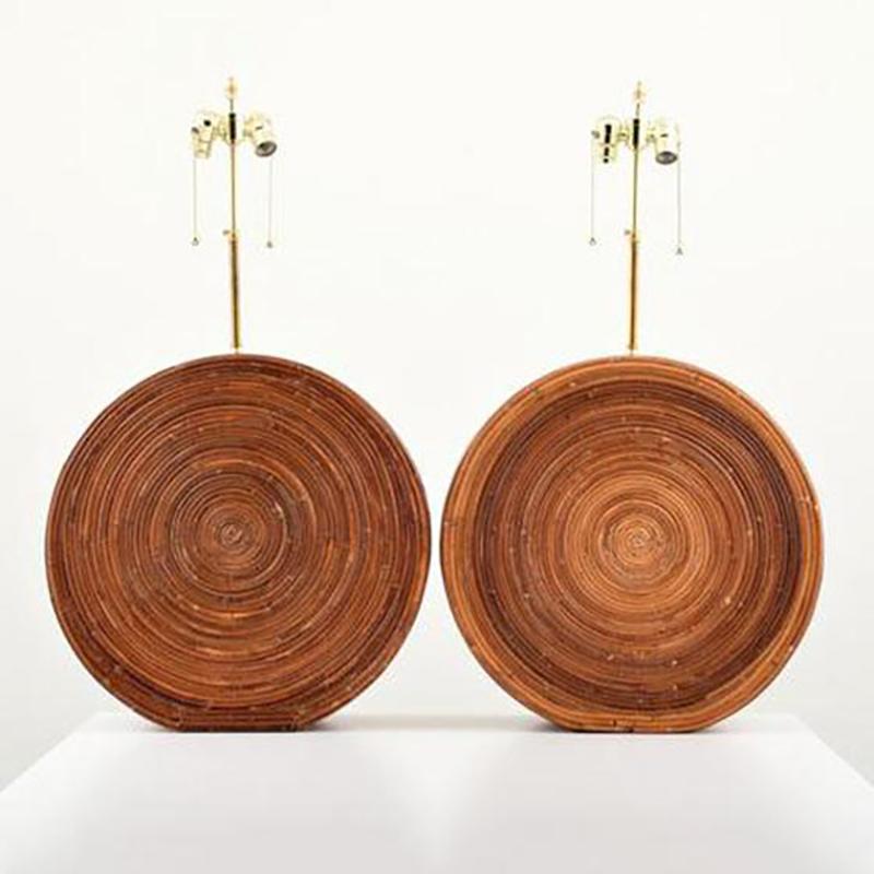 Pair of European midcentury rattan table lamps featuring an interesting wood spiral design.