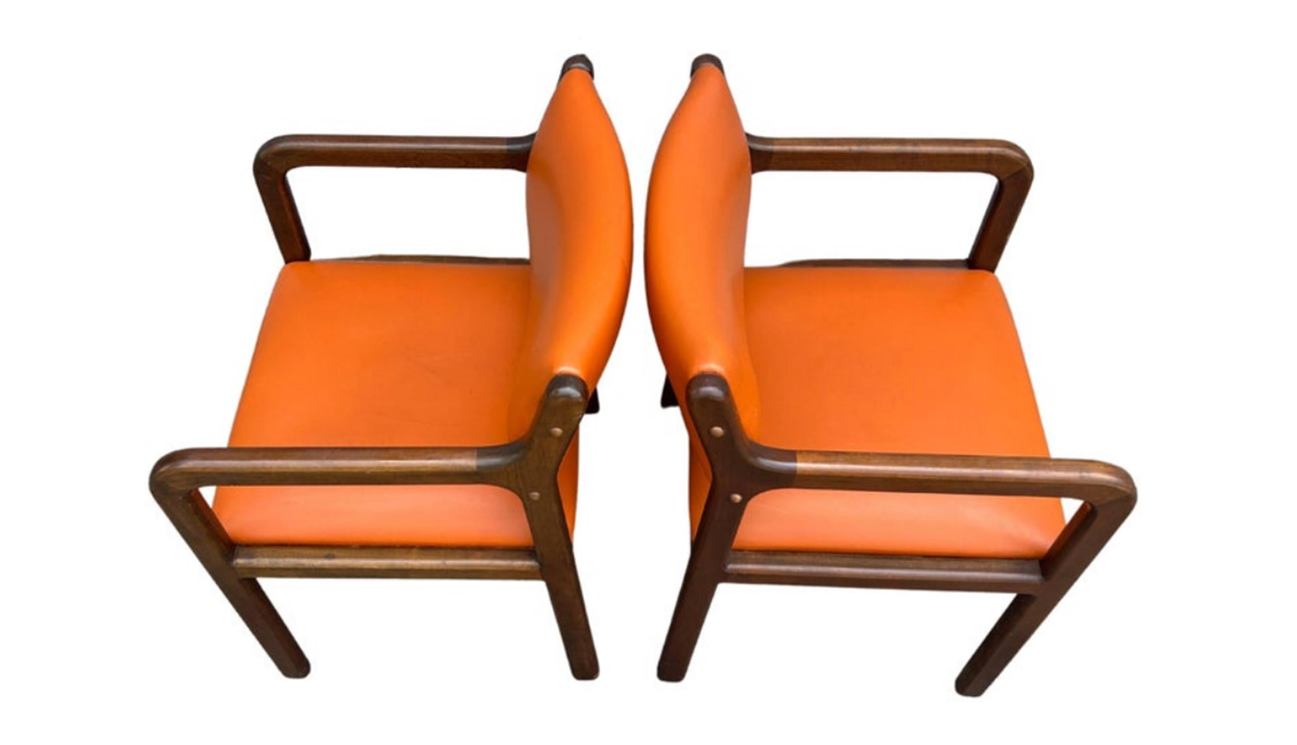 Woodwork Pair of Mid-Century Modern Rounded Walnut Arm Chairs with Orange Upholstery