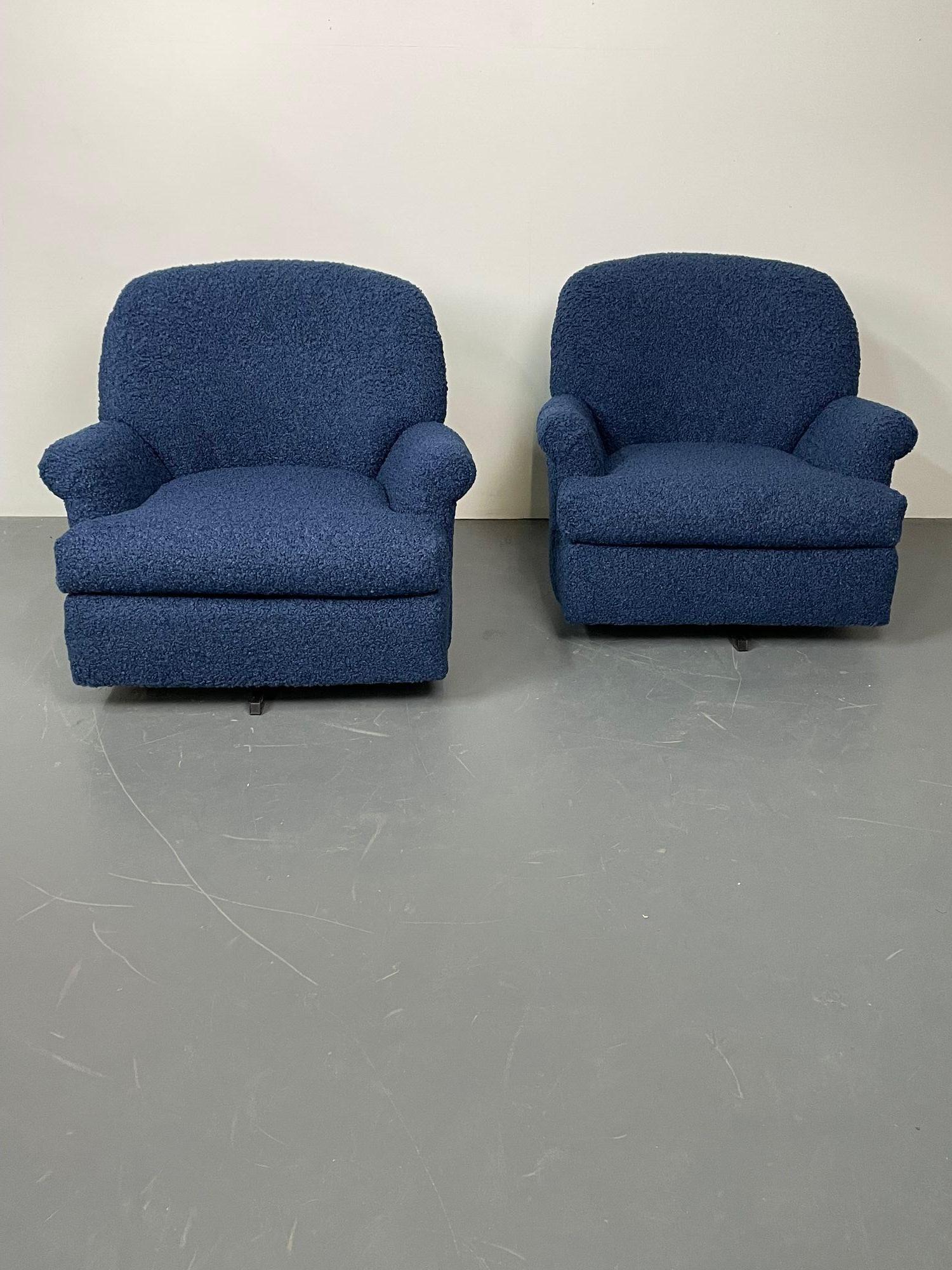 Pair of Mid-Century Modern scroll arm swivel lounge / arm chairs, Faux Shearling
Low profile swivel chairs newly re-upholstered in a blue boucle esque faux shearling fabric. New cushioning and swivel base. 
Other American designers of the period