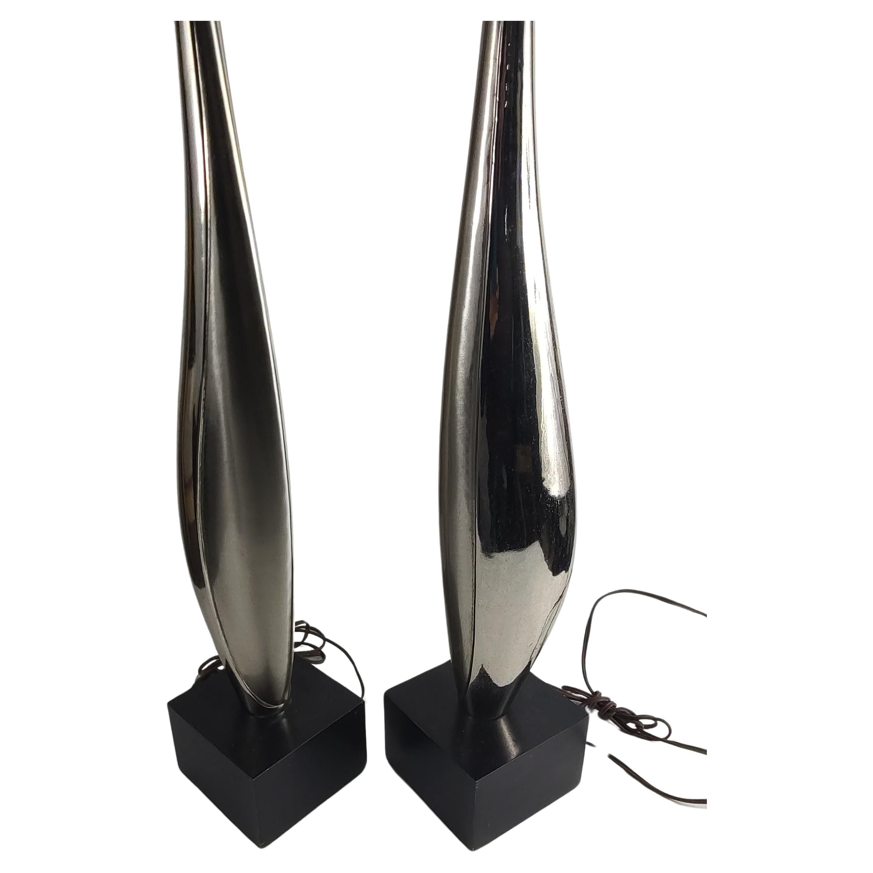 Molded Pair Mid Century Modern Sculptural Chrome w Black Plinth Bases Laurel Lamp Co. For Sale