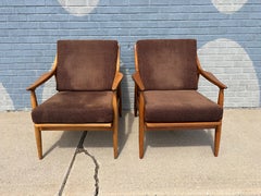 Pair of Mid-Century Modern Sculptural Walnut Lounge Chairs with Spindle Backs