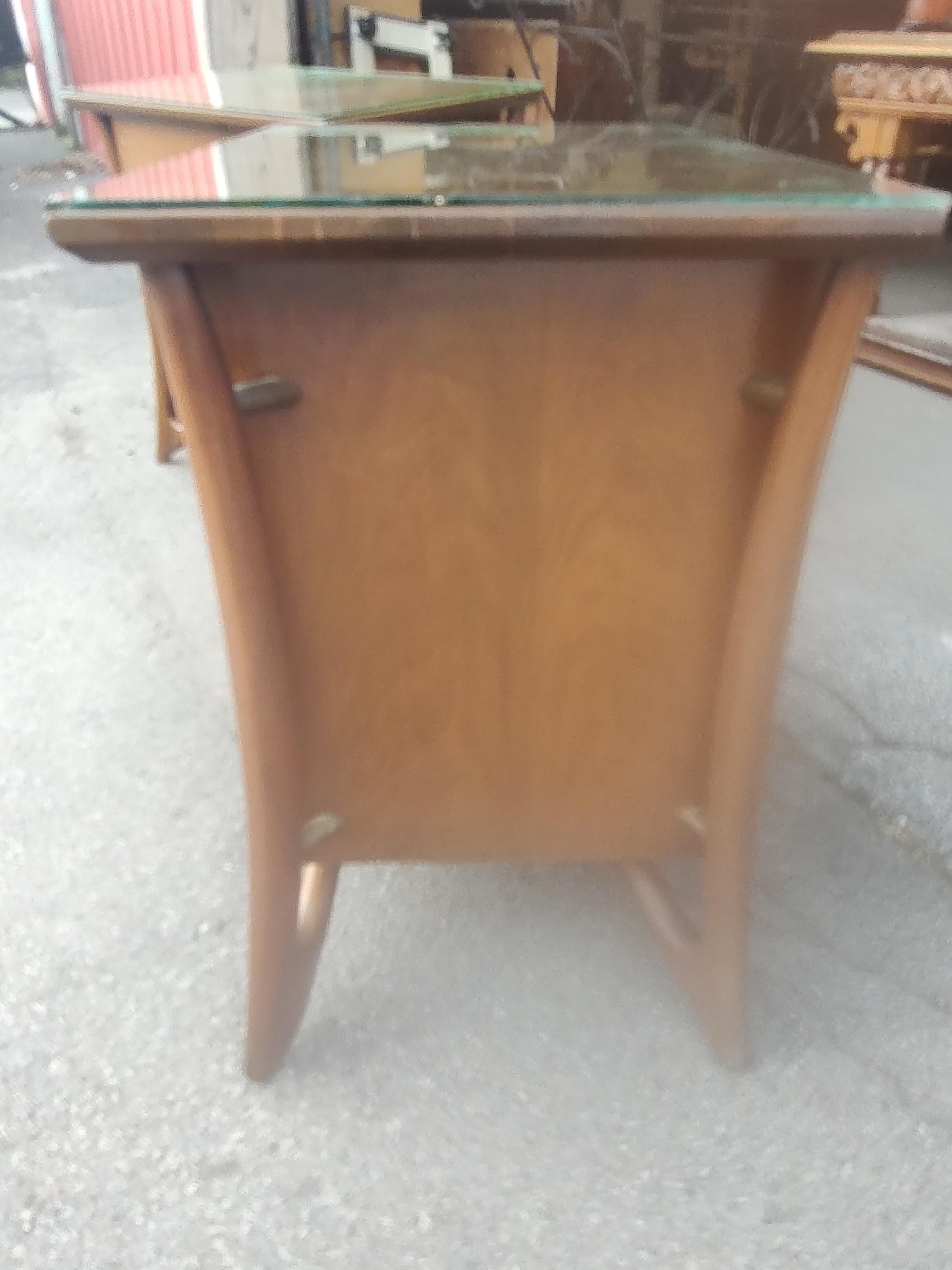 Fabulous pair of Mid-Century Modern Sculptural Walnut Night stands attributed to the Dutch designer Piet Hein. Unique and rare to find. Case sits on and is framed by a bent & turned frame. One drawer over two doors. In excellent vintage condition