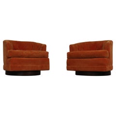 Pair of Mid-Century Modern Selig Barrel Back Swivel Club Chairs on Walnut Base