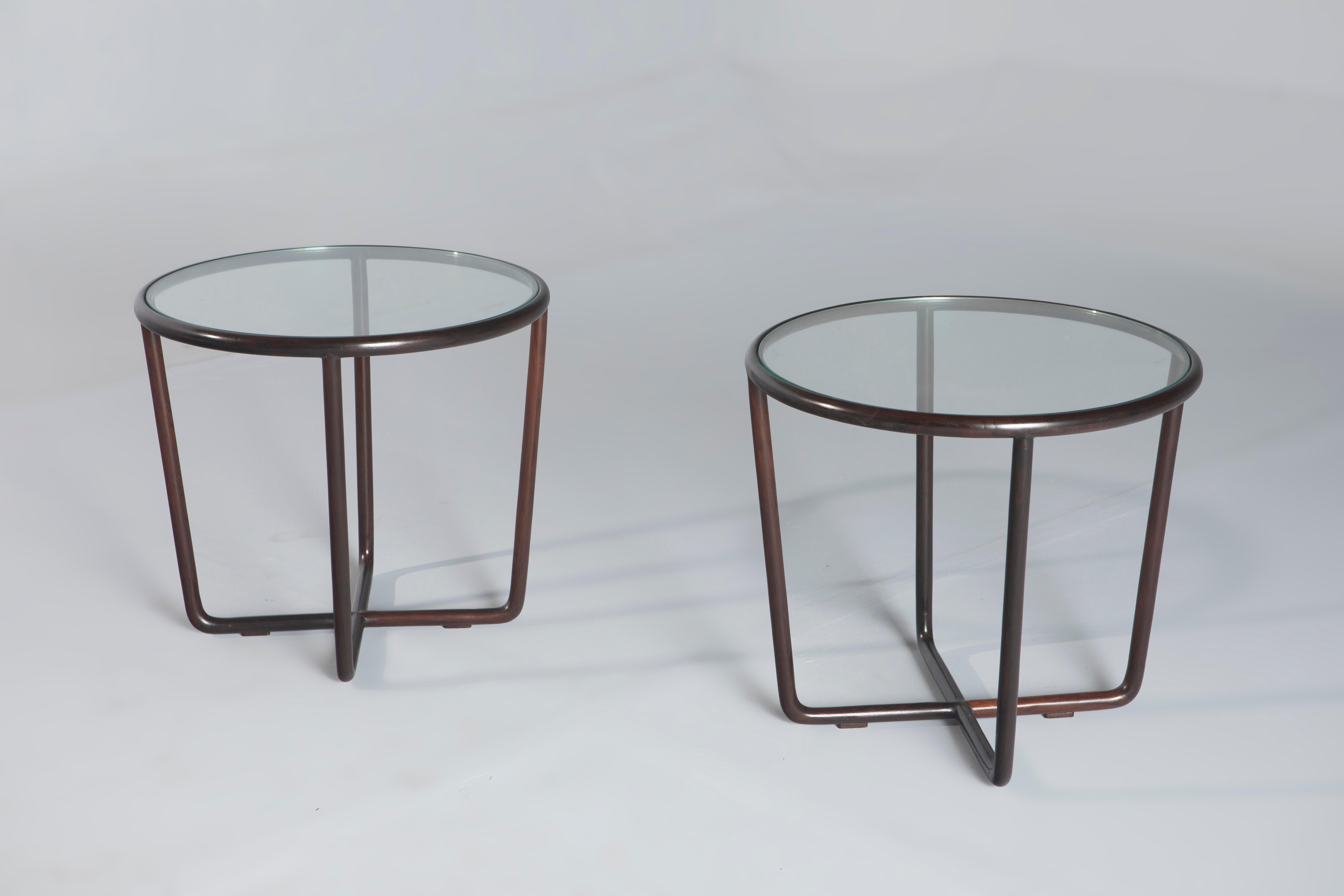 Pair of Mid-Century Modern side tables by Joaquim Tenreiro, Brazil, 1960s

The pair of side tables by Joaquim Tenreiro is a stunning example of the designer's signature style. Made from solid wood, these tables feature a beautiful and functional