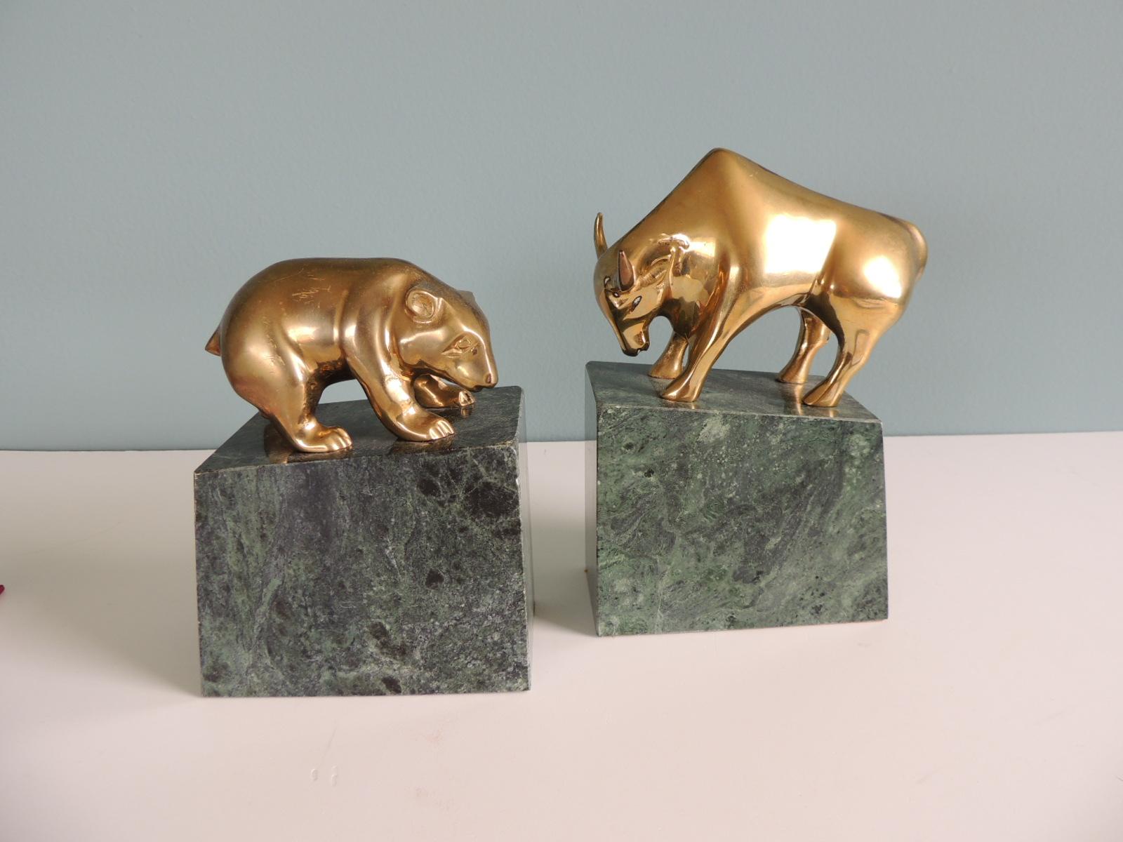 Pair of Mid-Century Modern solid brass and Marble bull and bear bookends
Sizes:
Bear: 5