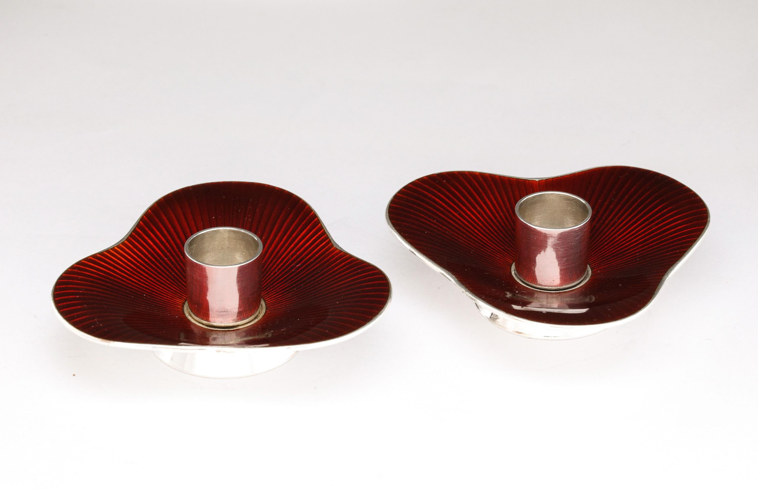 Pair of Mid-Century Modern, sterling silver and bright red enamel candlesticks, each having a pedestal base, Denmark, Ca. 1950's-60's, Meka - Maker. Each candlestick measures 2 1/4 inches wide at widest point x 2 1/4 inches deep at deepest point x 1