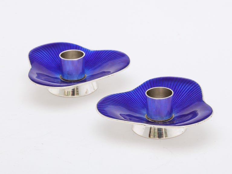 Pair of Mid-Century Modern, sterling silver and deep cobalt blue enamel candlesticks, each having a pedestal base, Denmark, Ca. 1950's-60's, Meka - maker. Each candlestick measures 2 1/4 inches wide (at widest point) x 2 1/4 inches deep (at deepest