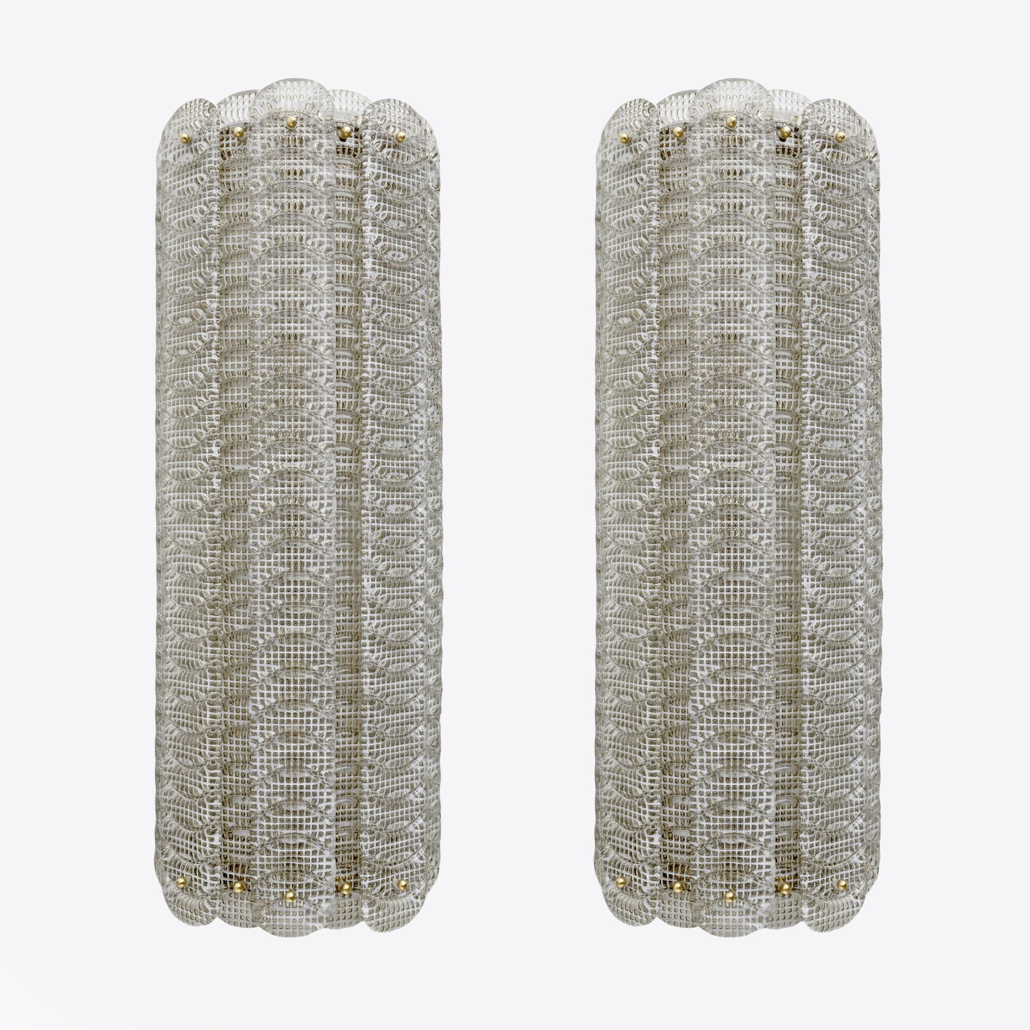 Extraordinary pair of Murano glass sconces, each featuring eight blades printed with 