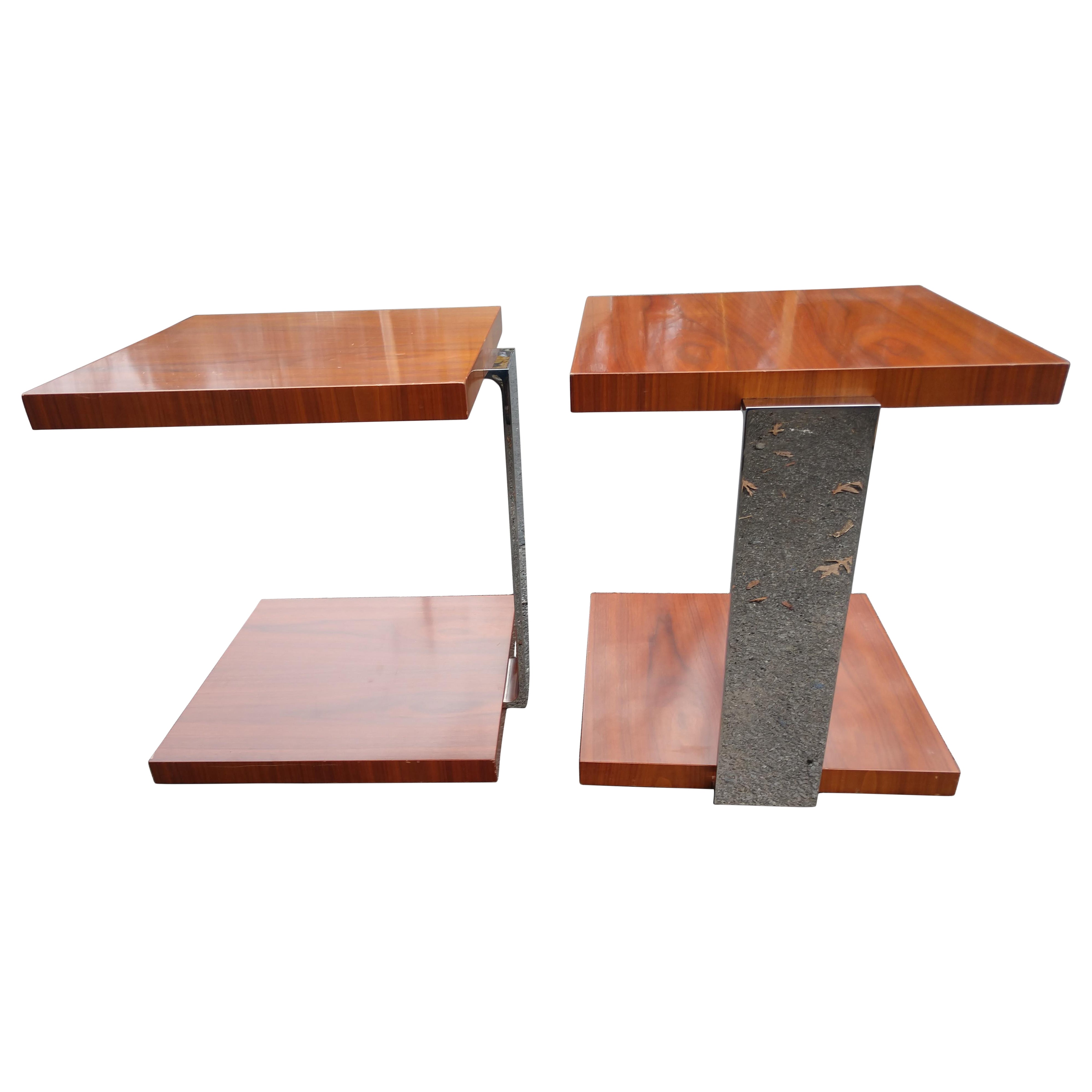 Fabulous and well constructed top quality pair of Walnut end tables with chromed steel supports. Would also work as night stands. Perfect blend of walnut and chrome. Large surface area for lighting and decorations. In excellent vintage condition