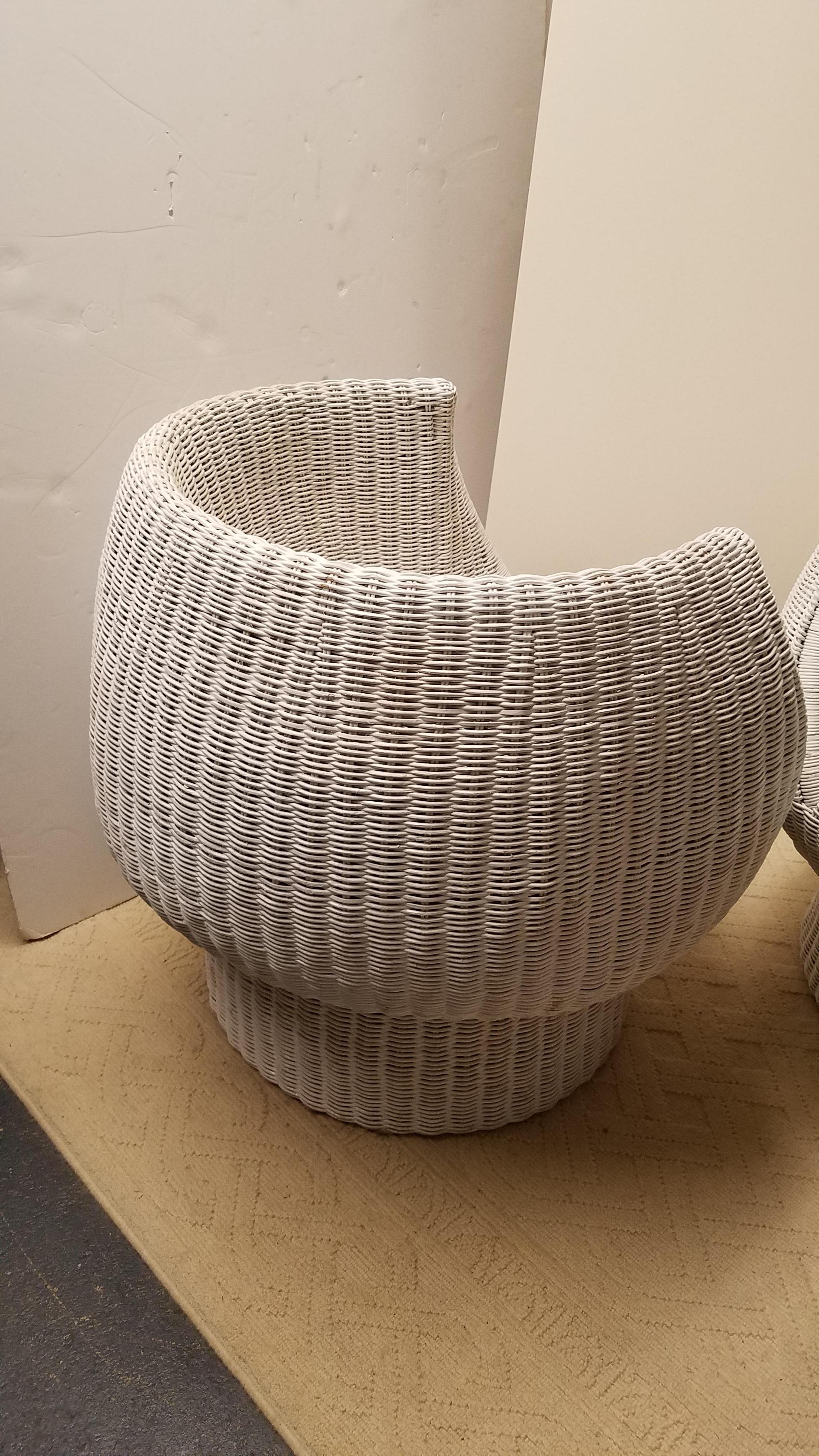 Style of Eero Aarnio pair of Mid-Century modern white wicker bubble chairs. Original paint in excellent condition. Slight rubbing on the back of one chair, but does not detract and wicker is not broken.
Measures: Seat height 16