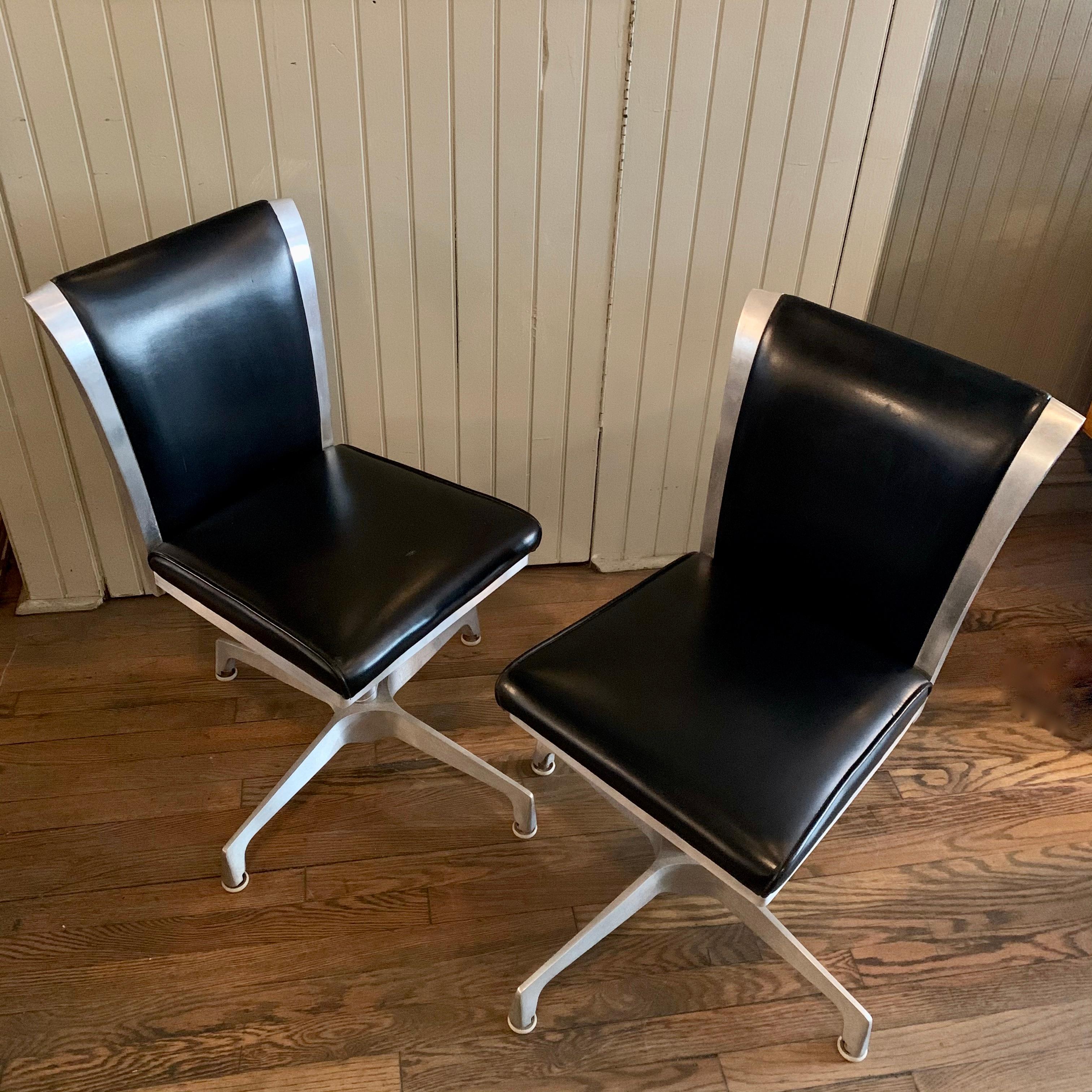 Faux Leather Pair of Mid-Century Modern Swivel Chairs