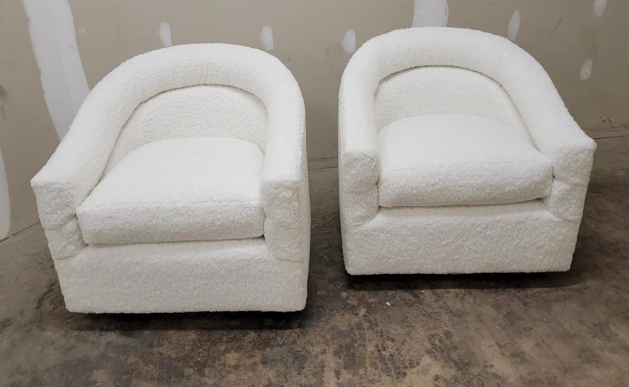 Late 20th Century Pair of Mid-Century Modern Swivel Chairs Newly Done in Boucle Faux Shearling