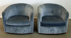 Pair of Mid-Century Modern Swivel Club Chairs on Wheels