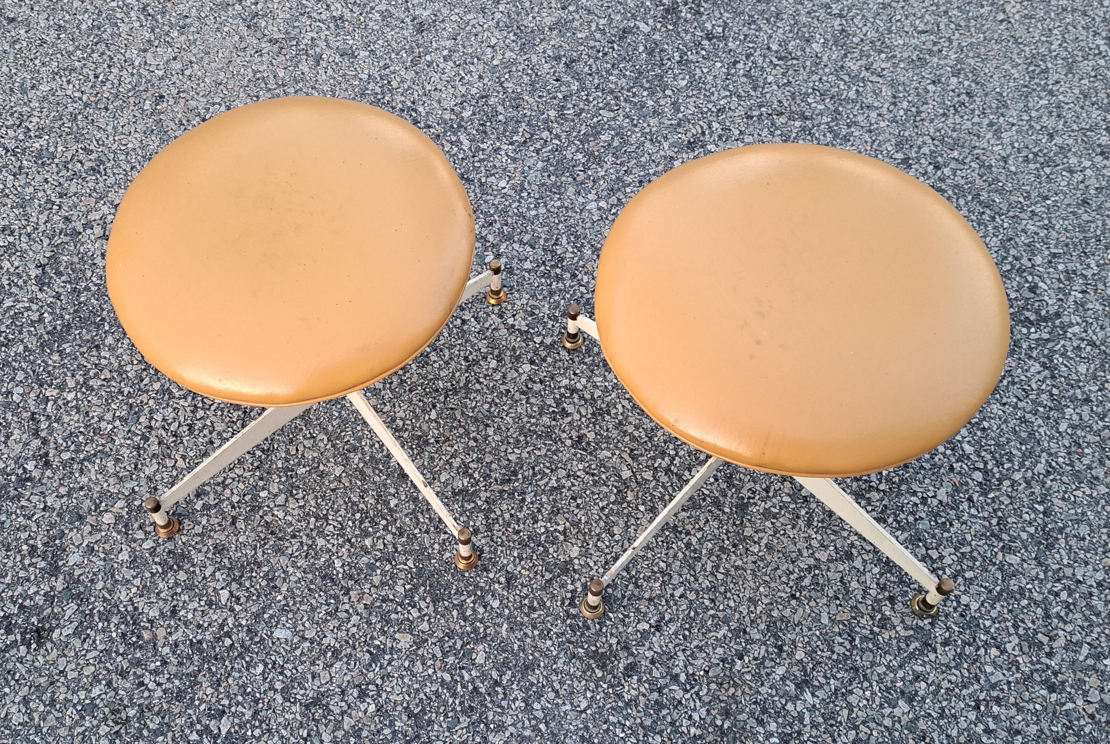Metal Pair of Mid-Century Modern Swivel Footstools For Sale