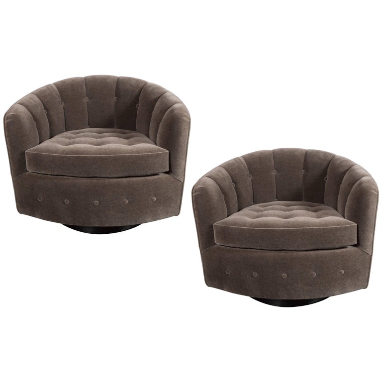 Pair of Mid-Century Modern Swiveling Barrel/ Button Back Chairs by Ward