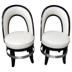 Pair of Mid-Century Modern Swiveling Club Chairs