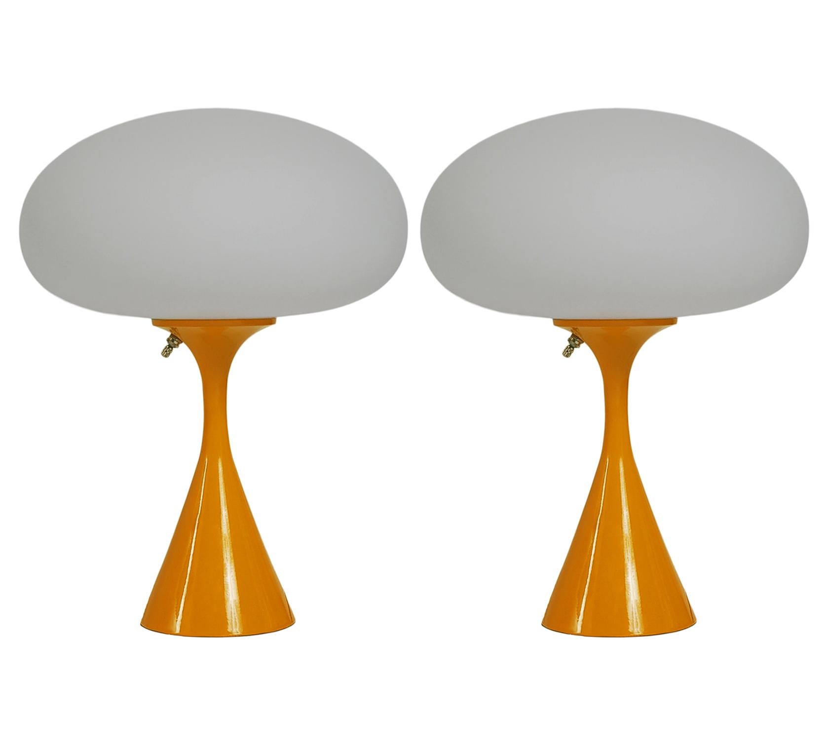 Contemporary Pair of Mid-Century Modern Table Lamps by Designline in Orange & White Glass For Sale
