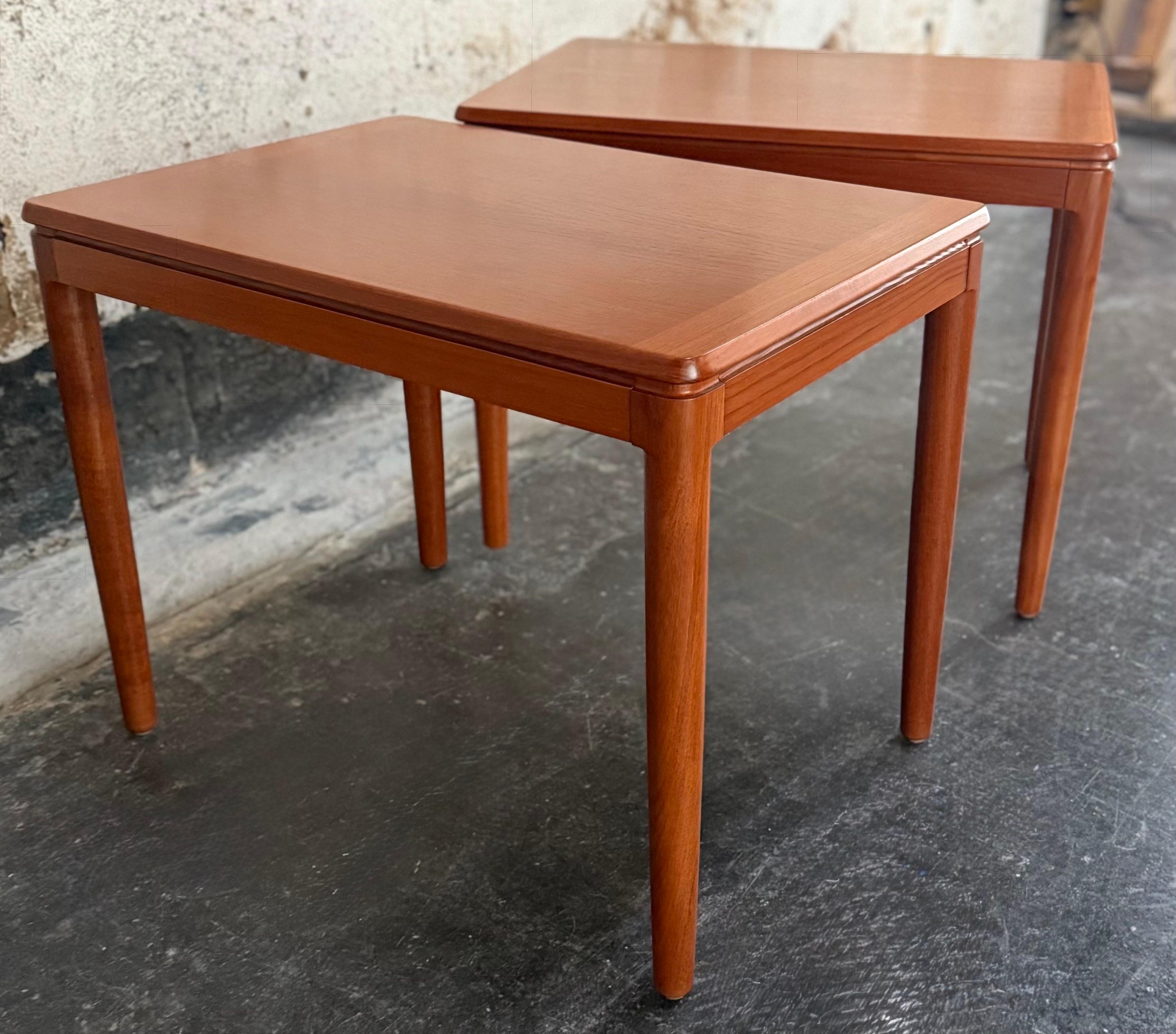 Handsome pair of Swedish Mid-Century Modern teak side tables attributed to manufacturer Göte Möbler Nässjö. Dating from circa 1960, these tables are excellent examples of Scandinavian modern design and quality craftsmanship.

Fine construction