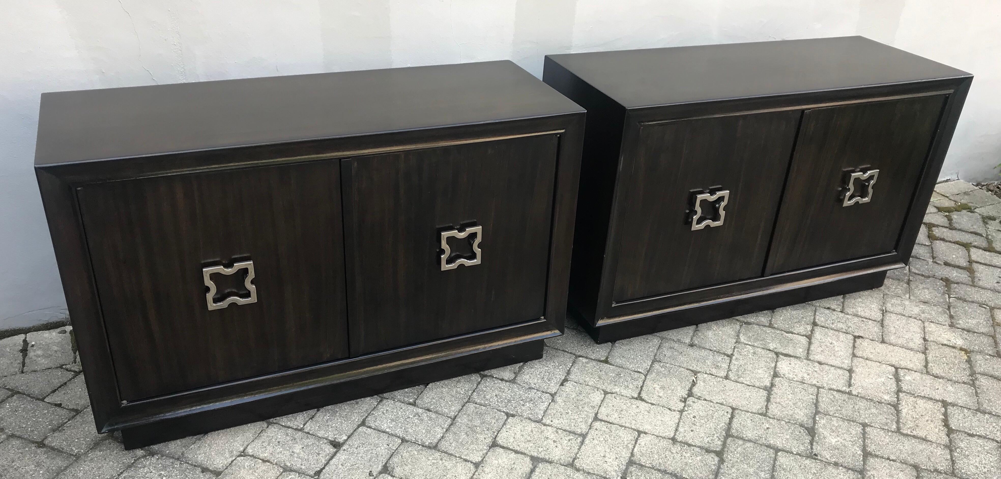 Beautiful pair of Tommi Parzinger style large scale nightstands, storage cabinets or small credenzas, one adjustable shelf in each.