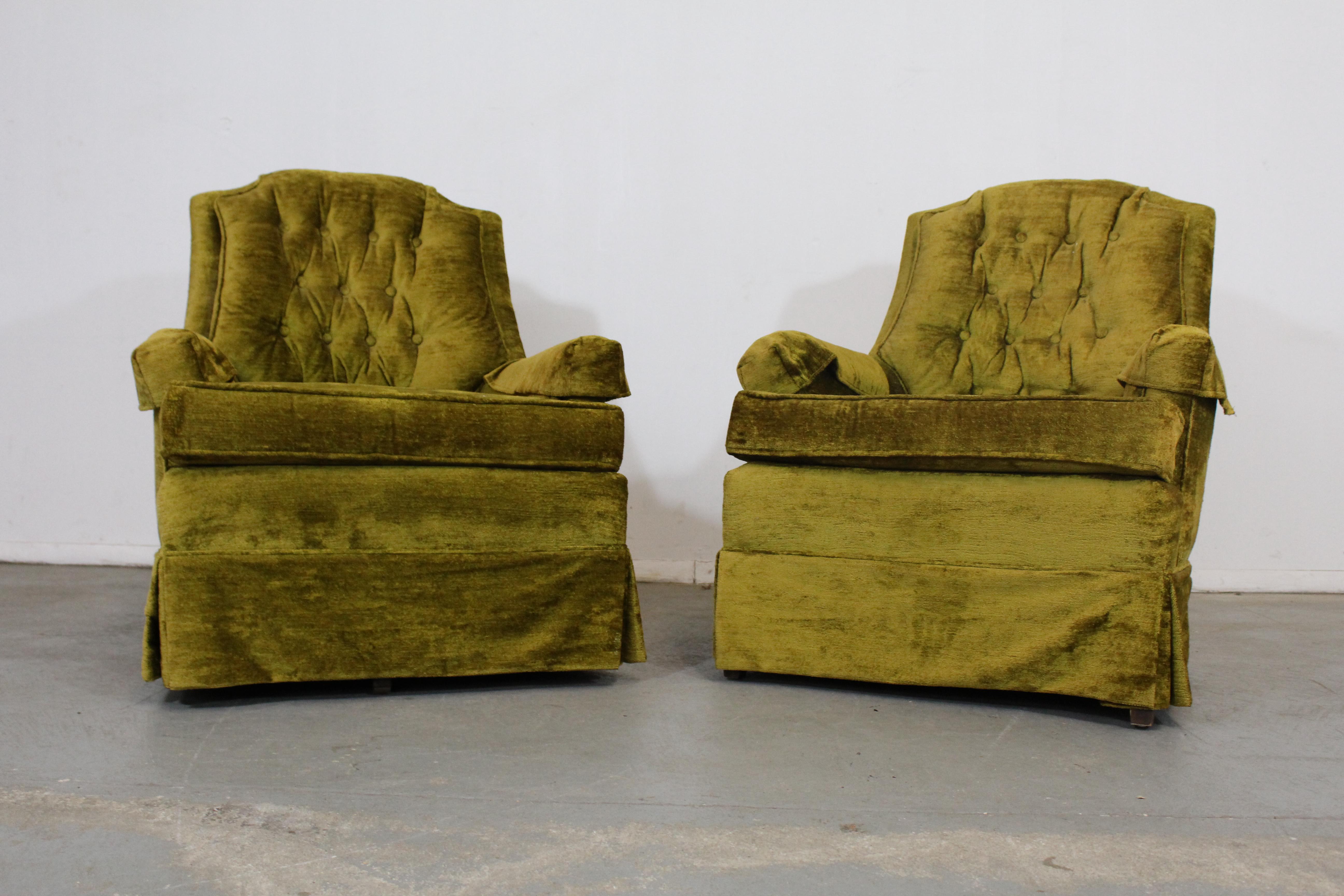 Pair of Mid-Century Modern tufted back club chairs
Offered is a pair of club chairs. The chairs feature 1 swivel rocker and 1 legged chair the upholstery is in unusable condition and is structurally sound. The upholstery has minor age wear, stains