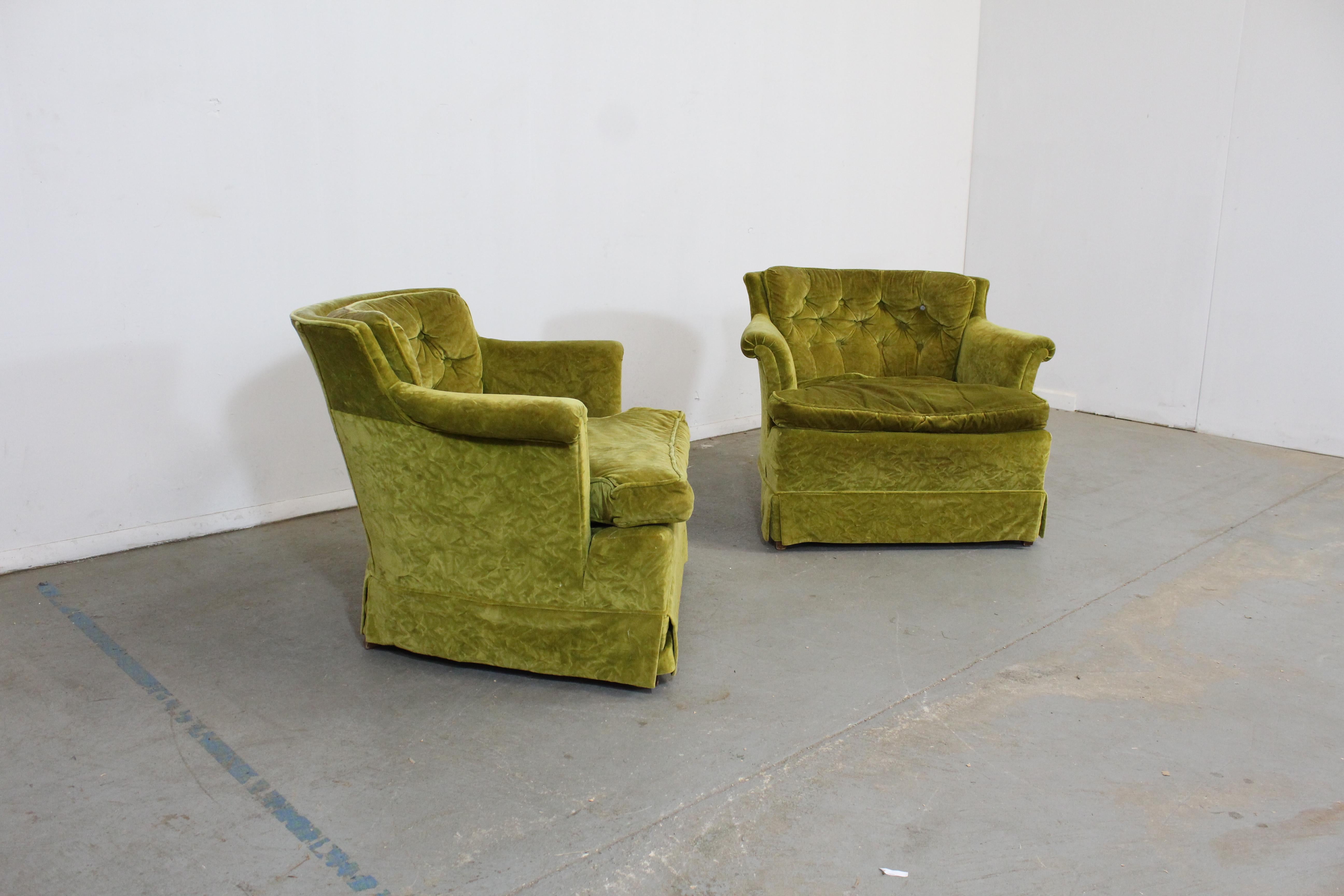 Pair of Mid-Century Modern tufted club chairs

Offered is a pair of club chairs. They are unsigned. These two chairs could stand to be reupholstered due to staining and age wear on the fabric. The chairs are structurally sound. See our other