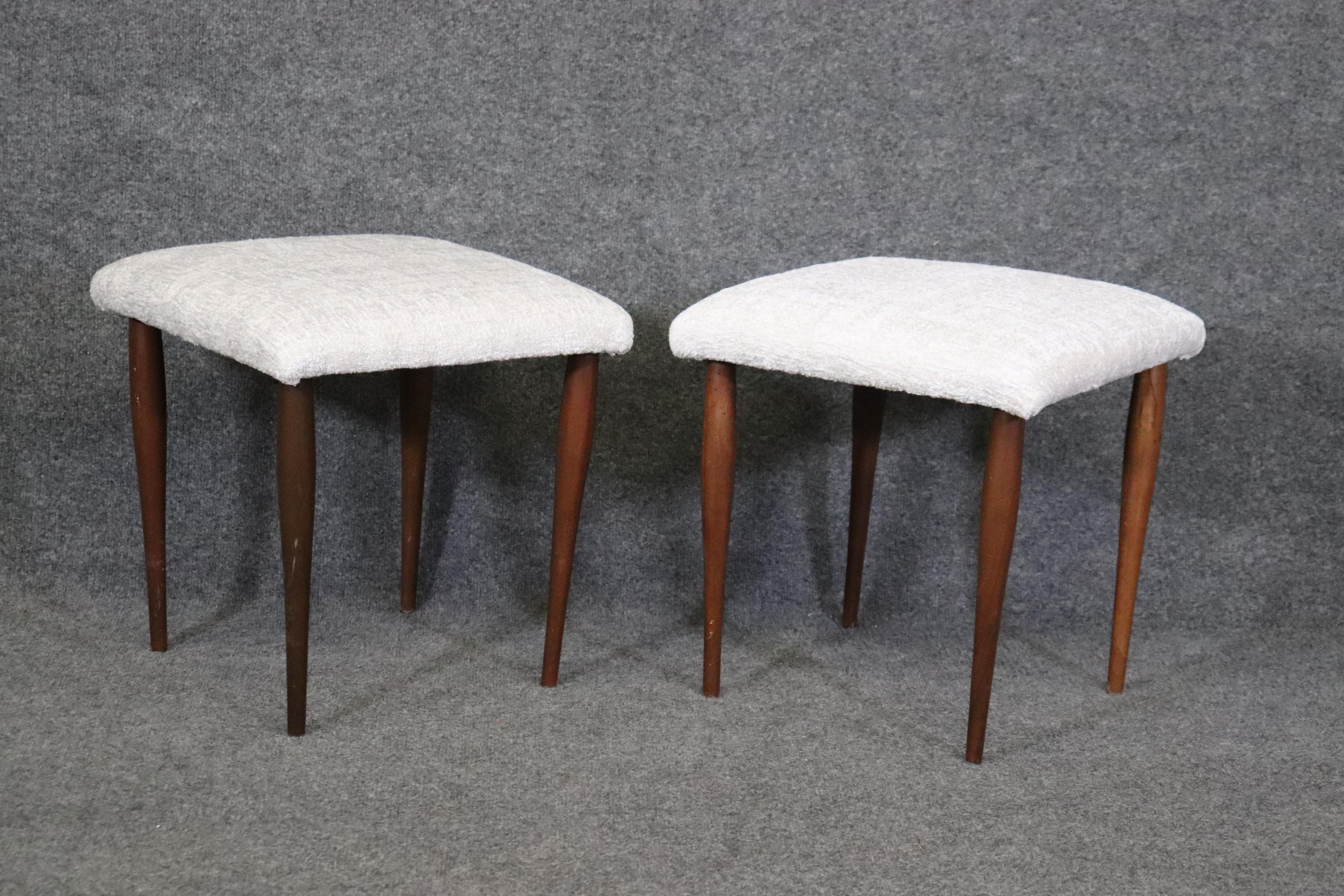Dimensions- H: 16 1/22in W: 15 3/4in D: 15 1/2in 

This pair of Mid Century Modern upholstered stools benches is truly unique and is bound to bring a creative sense of class and character into your home or place of choosing! This pair is perfect for