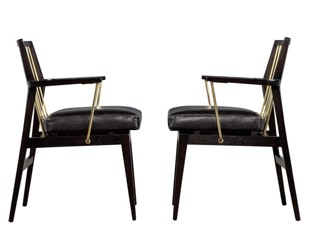 Late 20th Century Pair of Mid-Century Modern Vintage Leather Arm Chairs with Brass Accents