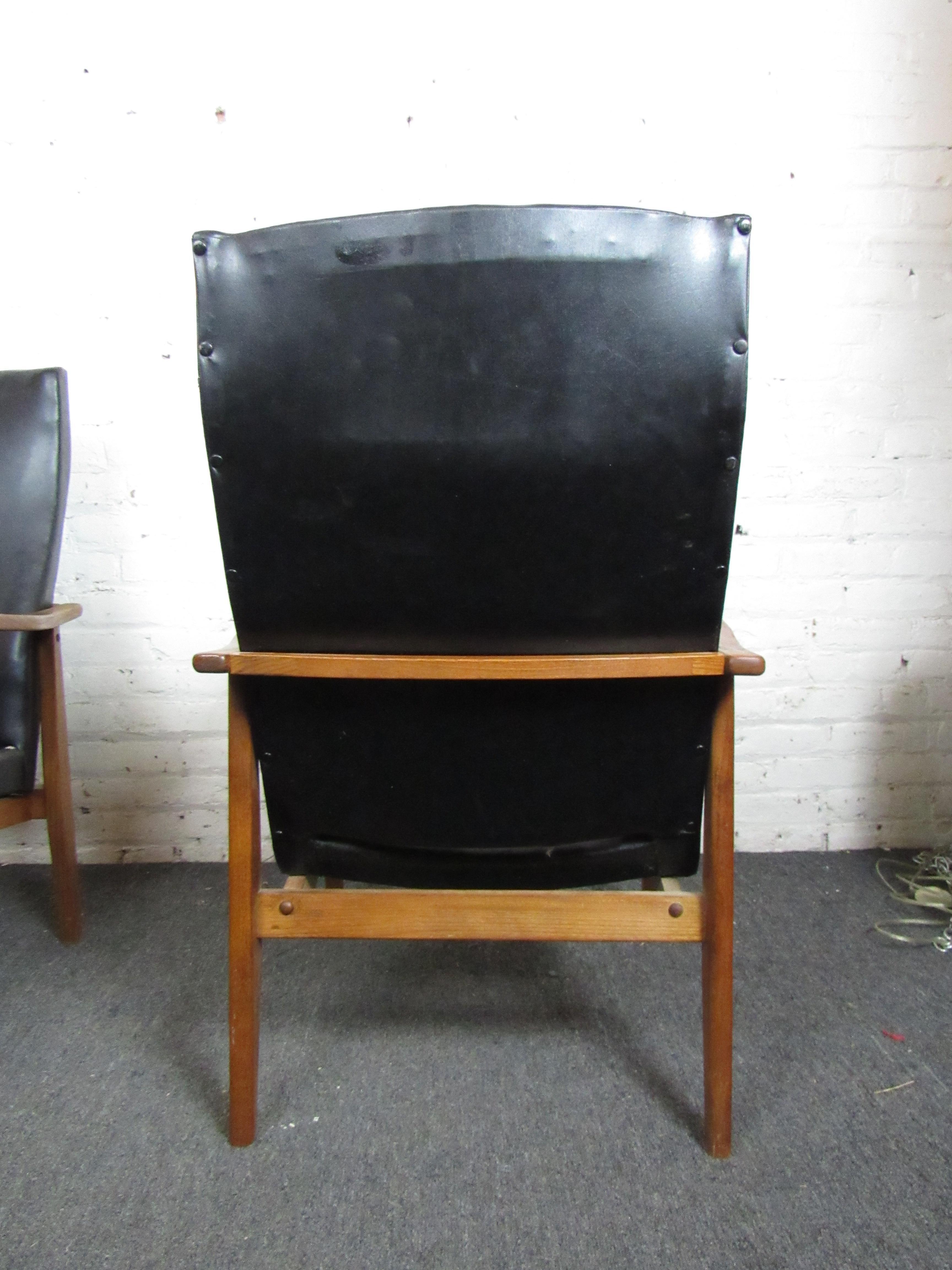 Pair of Mid-Century Modern Vinyl Lounge Chairs For Sale 11