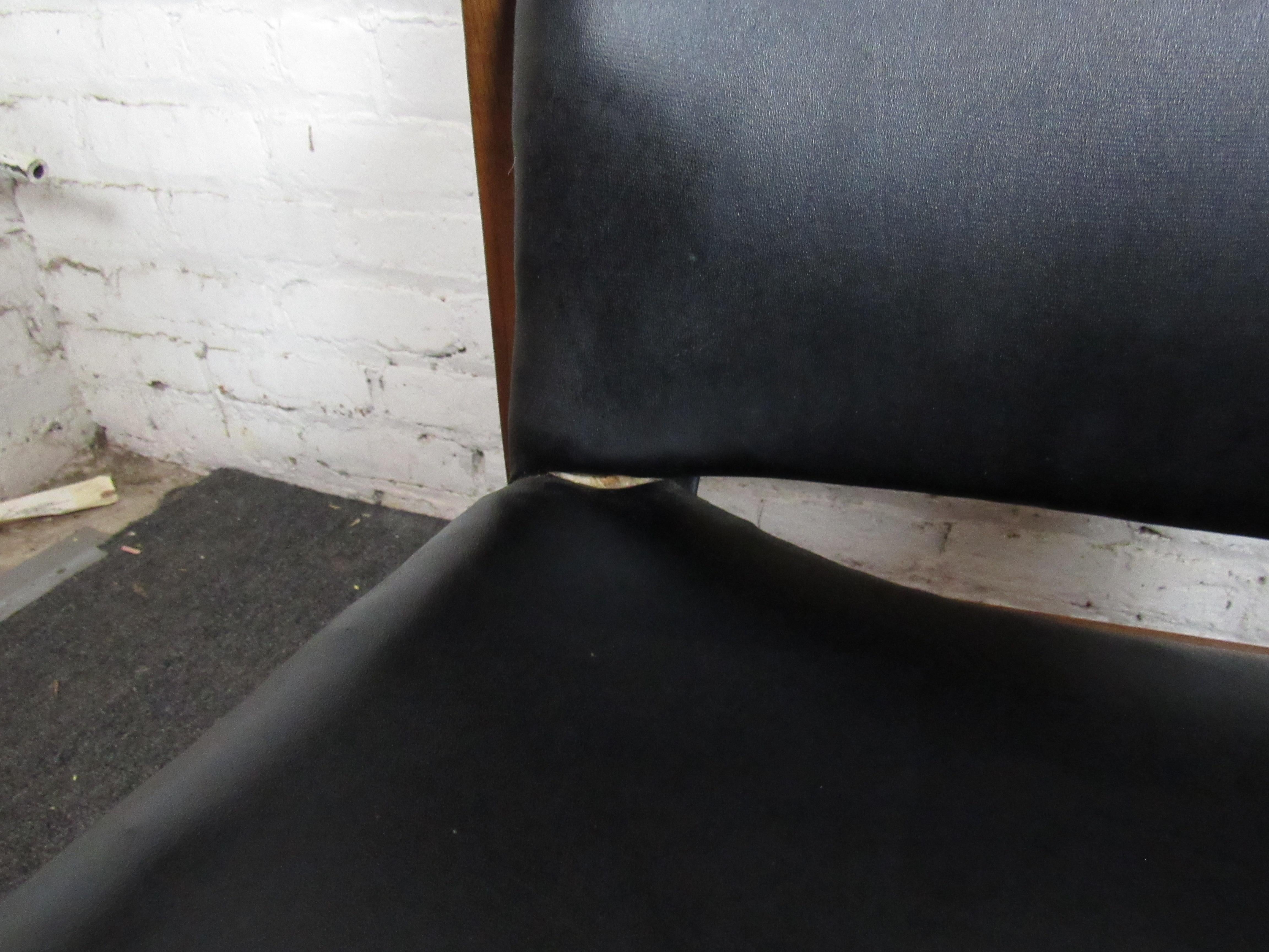 Pair of Mid-Century Modern Vinyl Lounge Chairs For Sale 1