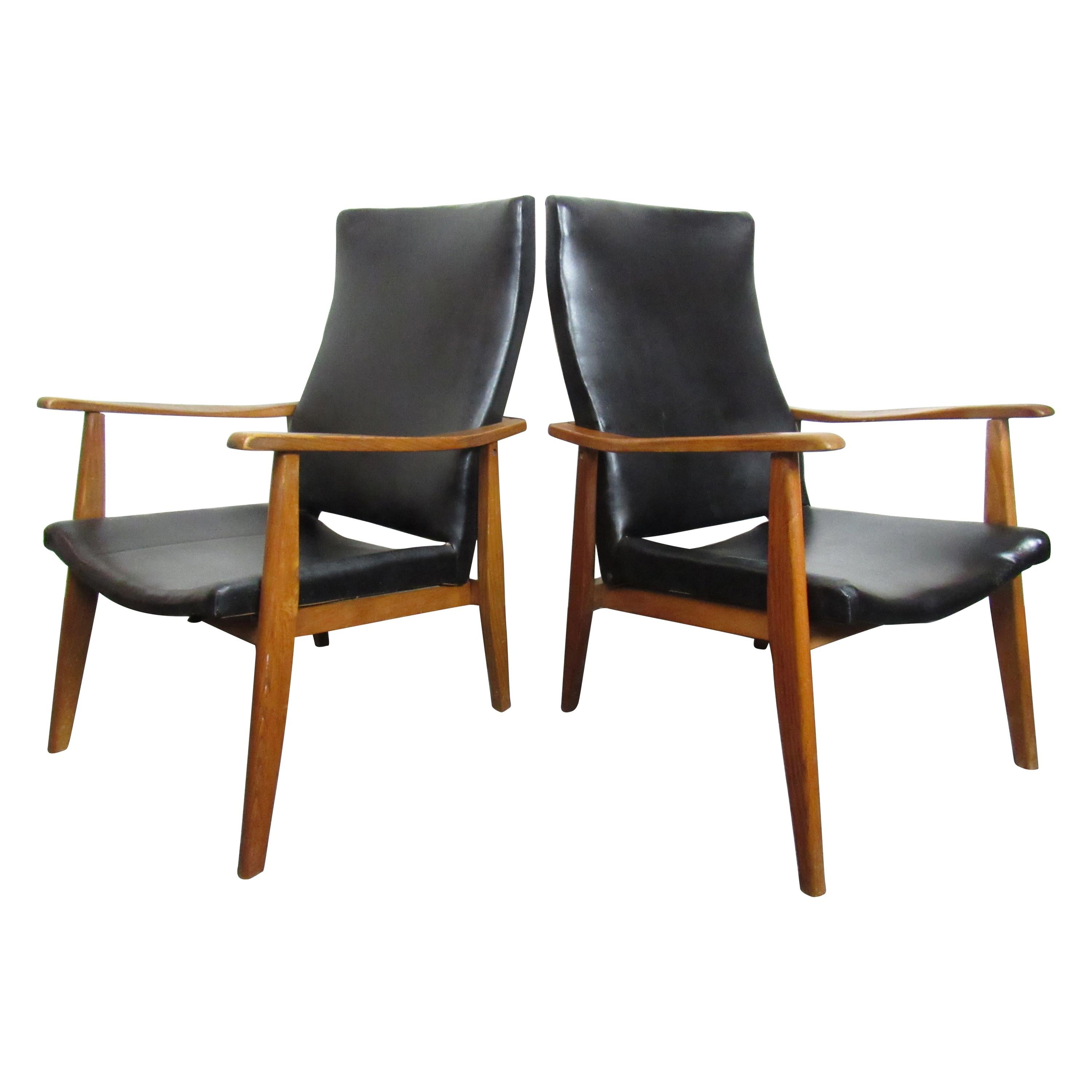 Pair of Mid-Century Modern Vinyl Lounge Chairs For Sale