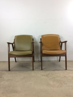 Pair of Mid Century Modern Vinyl Lounge Chairs with Walnut Frame
