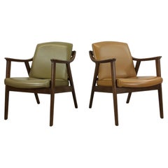 Pair of Mid Century Modern Vinyl Lounge Chairs with Walnut Frame