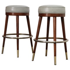 Pair of Mid-Century Modern Walnut and Brass Bar Stools with New Leather Seats
