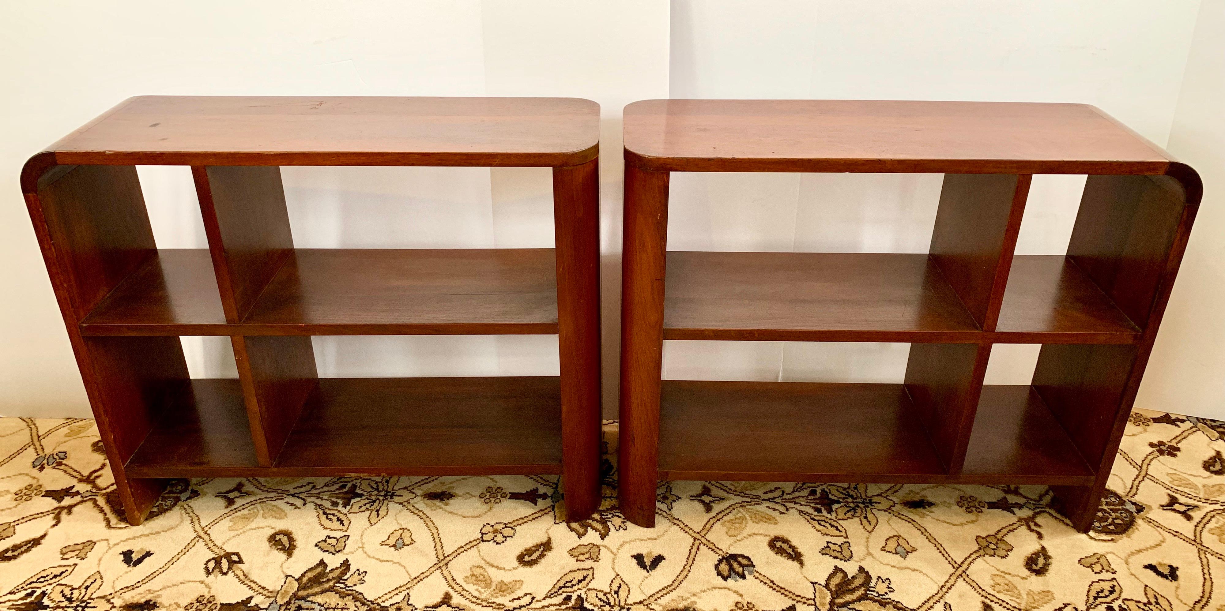 Matching pair of Mid-Century Modern walnut nightstand bookshelves. Multipurpose with great scale and functionality.