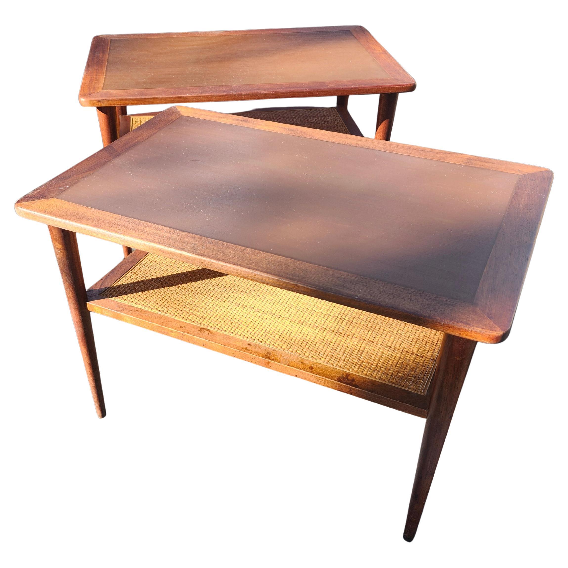 Pair of Mid Century Modern Walnut End Tables with a Caned Shelf