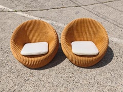 Pair of Mid Century Modern Wicker Lounge Chairs in the style of Isamu Kenmochi
