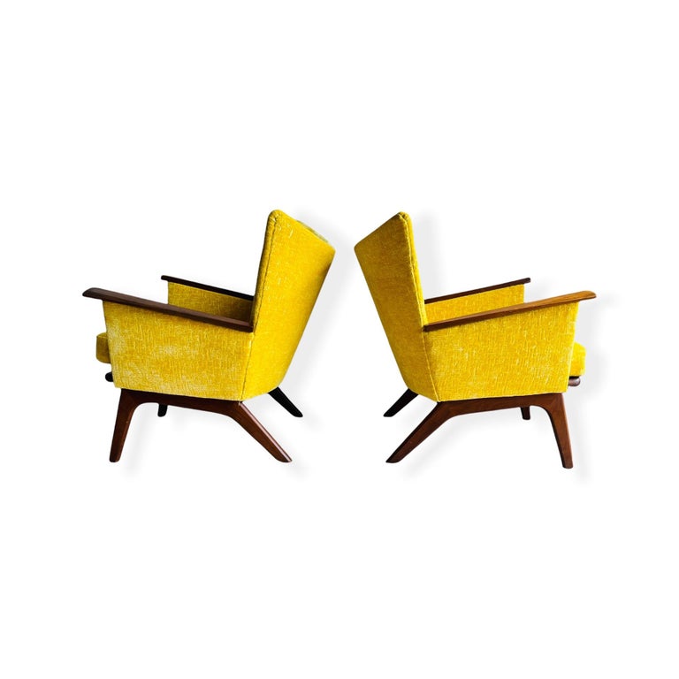 Here is a stunning pair of Mid-Century Modern Adrian Pearsall Wingback Lounge chairs newly reupholstered with brand new cushions and foam. The frame and the wood accent on arms are made out of Walnut. The chairs are in good vintage condition with