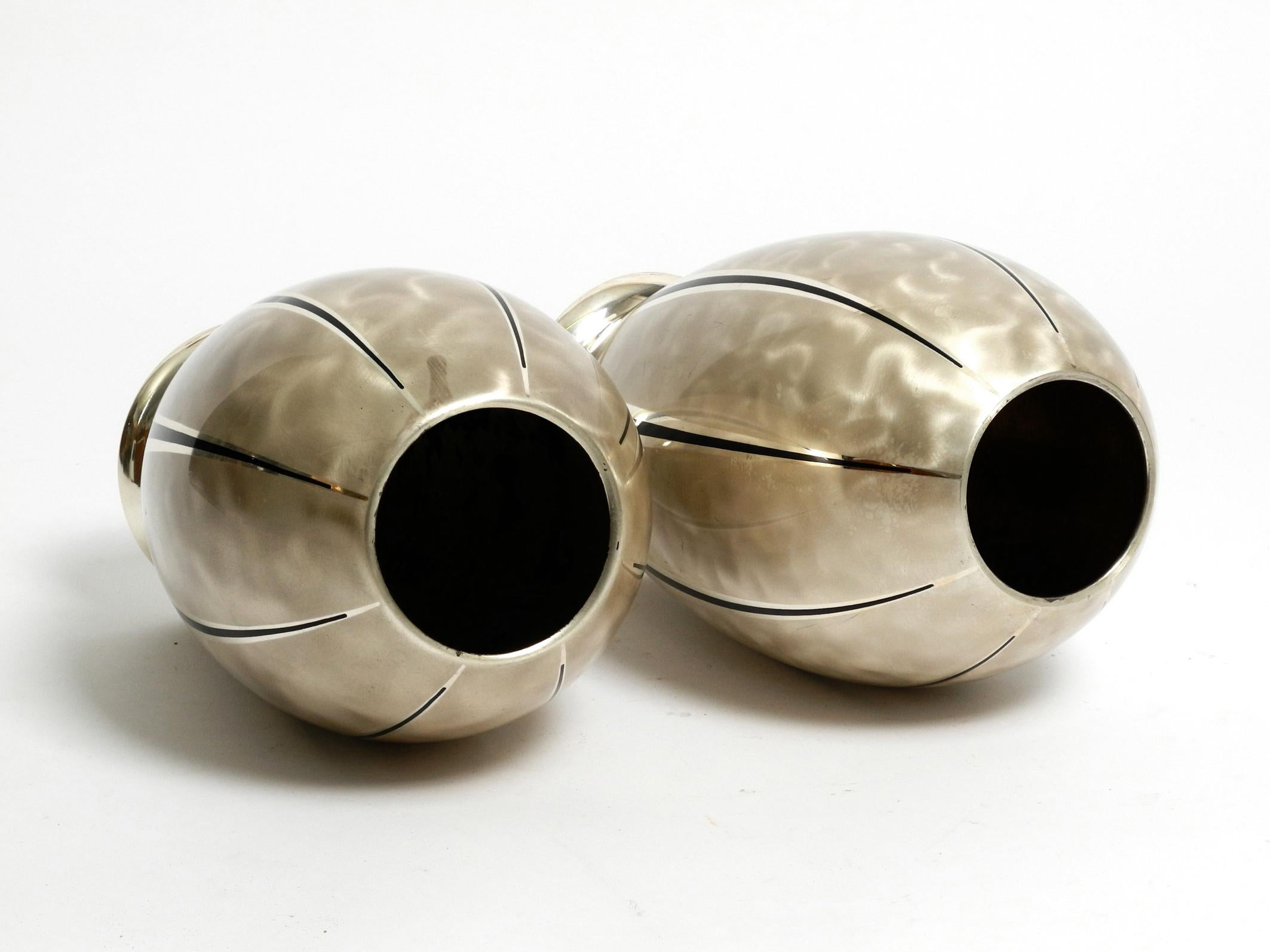Mid-Century Modern Pair of Mid Century Modern WMF Ikora table vases made of silver-plated brass