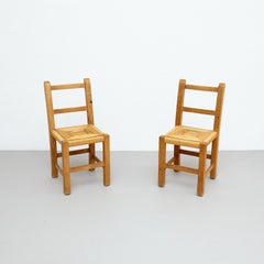 Pair of Mid-Century Modern Wood and Rattan French Rationalist Chairs, circa 1950
