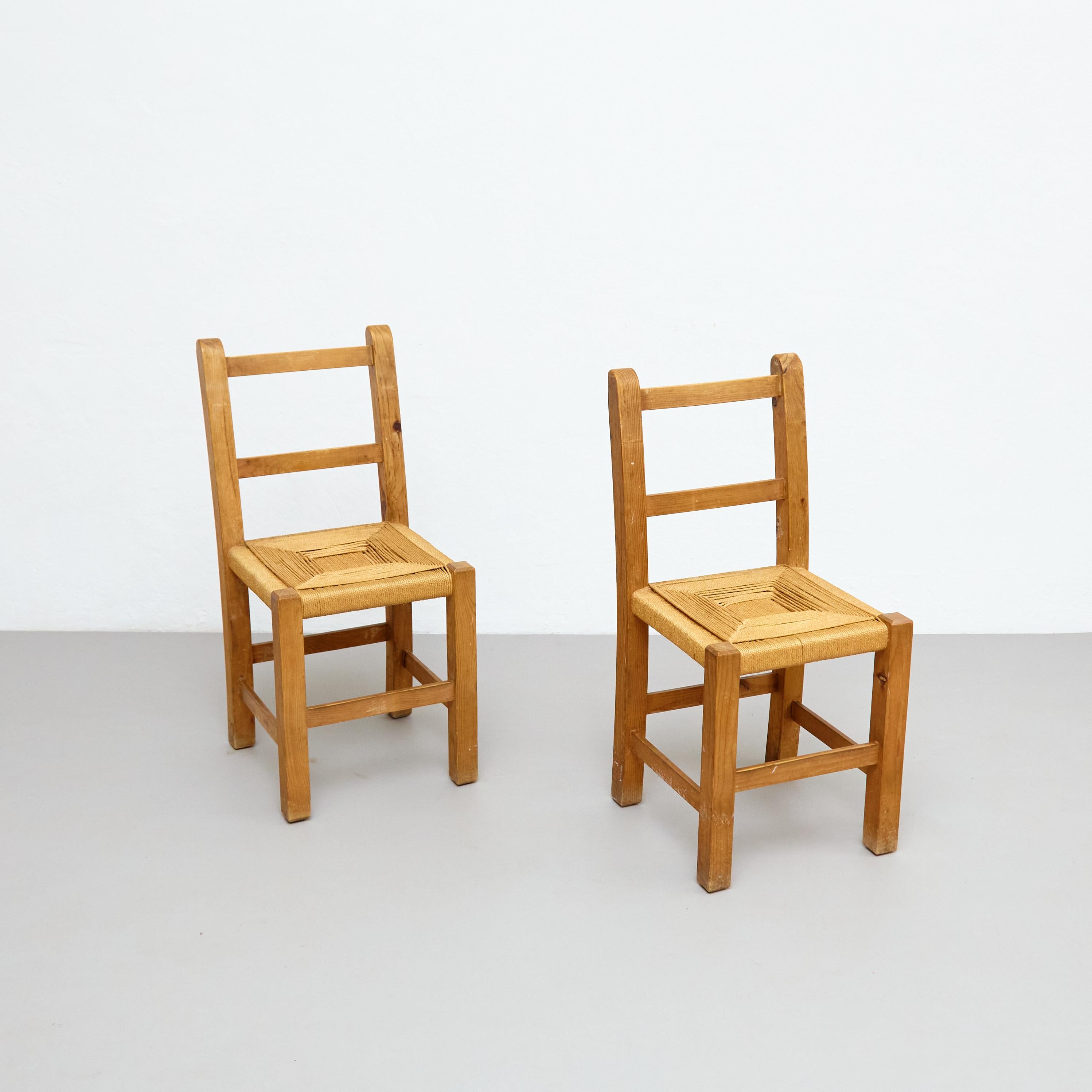 Mid-20th Century Pair of Mid-Century Modern Wood and Rattan French Rationalist Chairs, circa 1950 For Sale