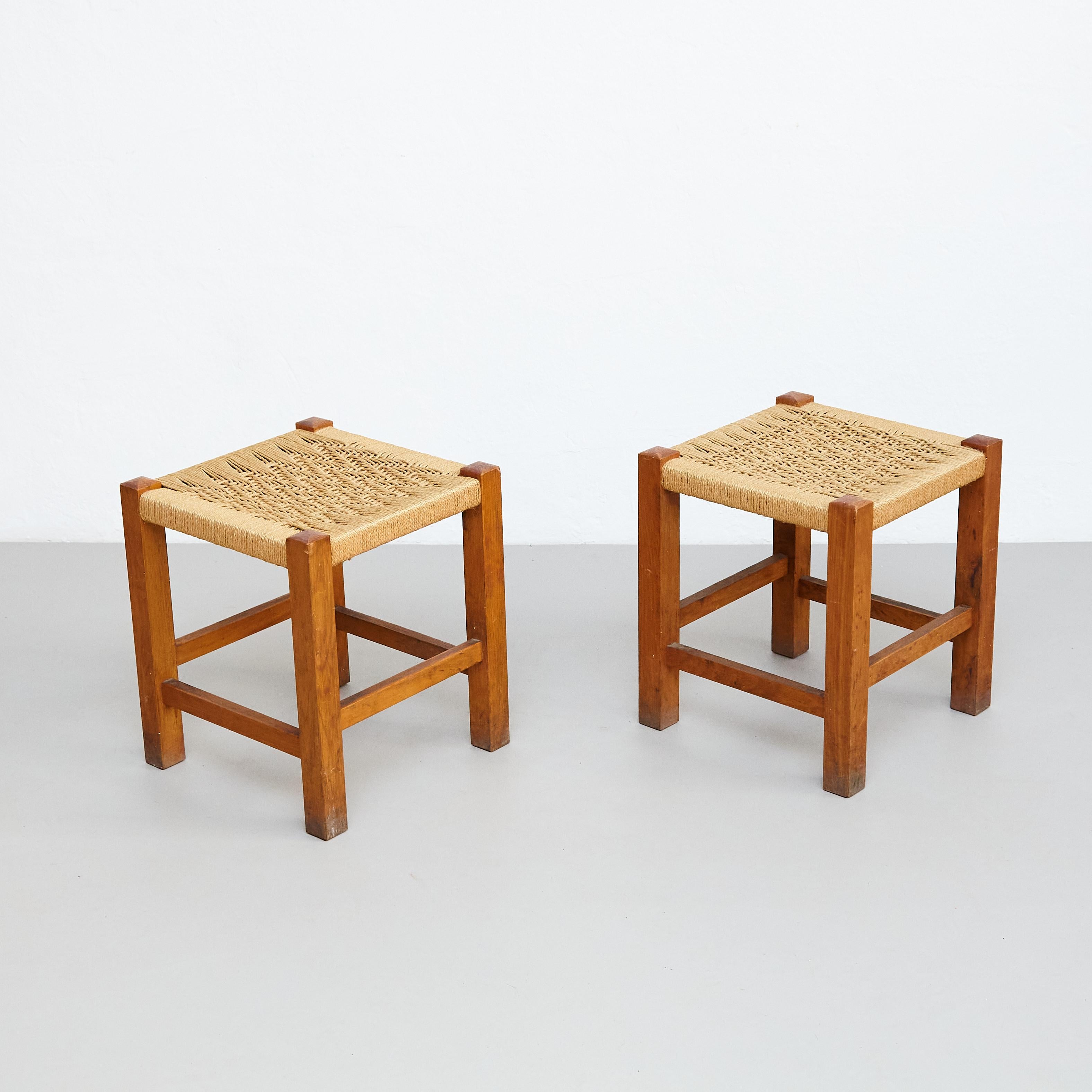 Pair of Mid-Century Modern Wood and Rattan French Stools, circa 1960 In Good Condition For Sale In Barcelona, Barcelona